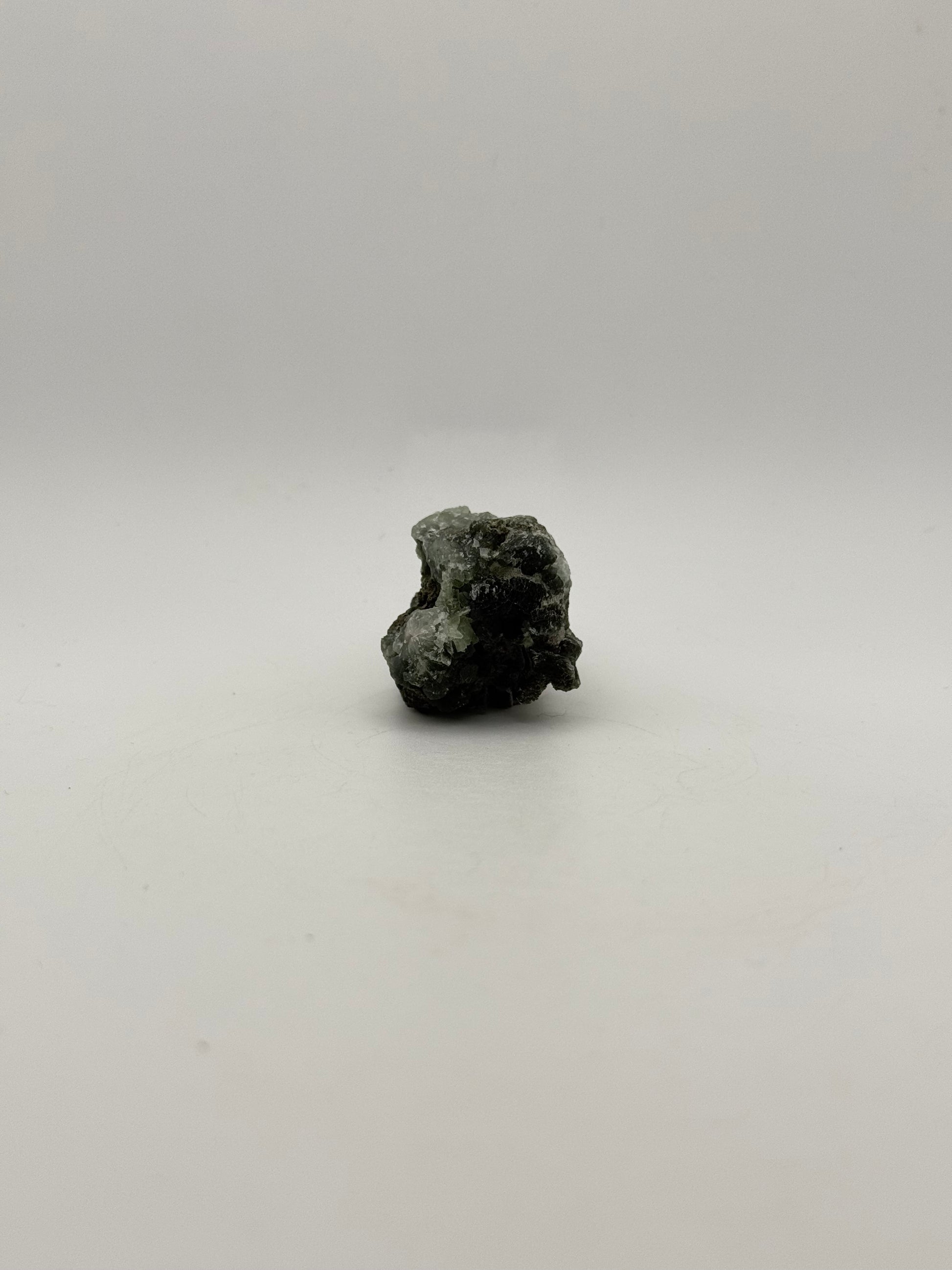 Raw prehnite specimen with amazing green color.