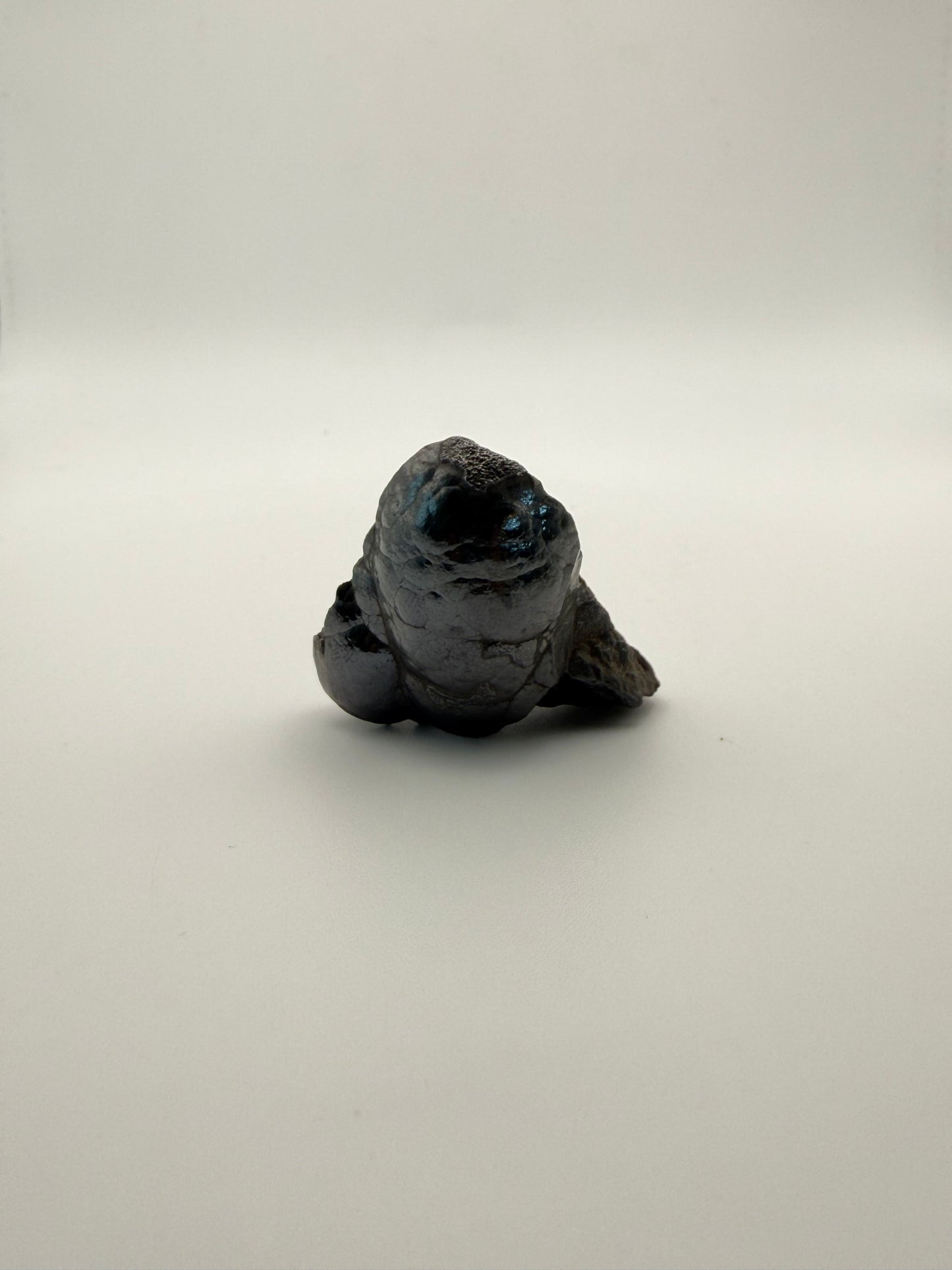 Small raw hematite specimen.