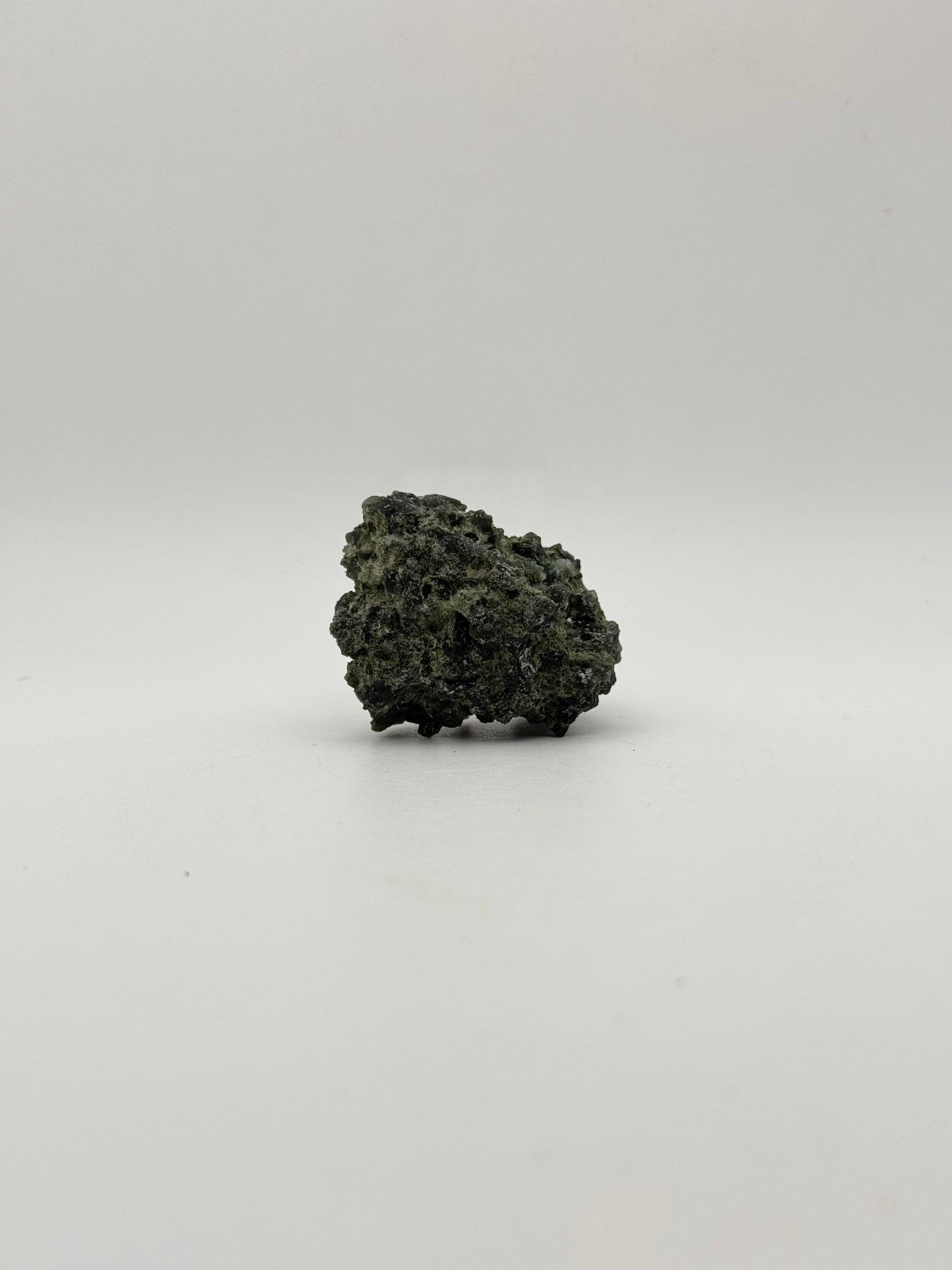 Raw prehnite specimen with amazing green color.