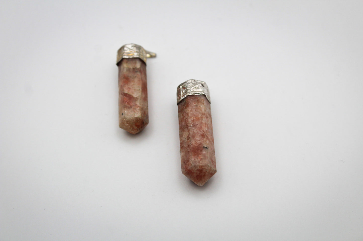 Sunstone pencil pendants.