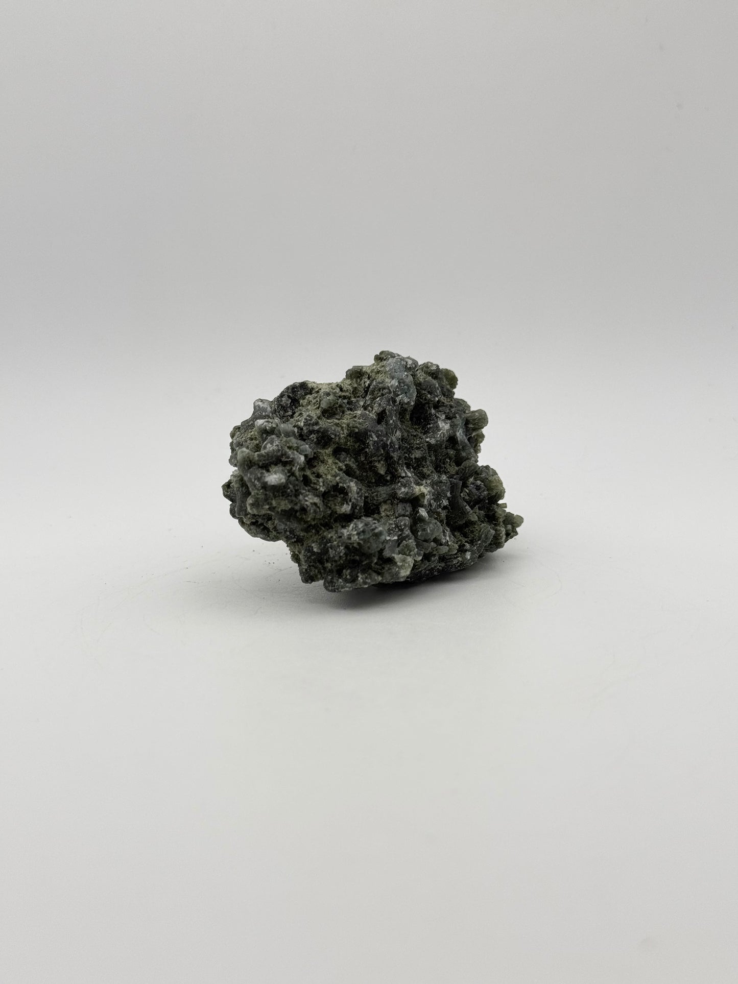 Raw prehnite specimen with amazing green color.