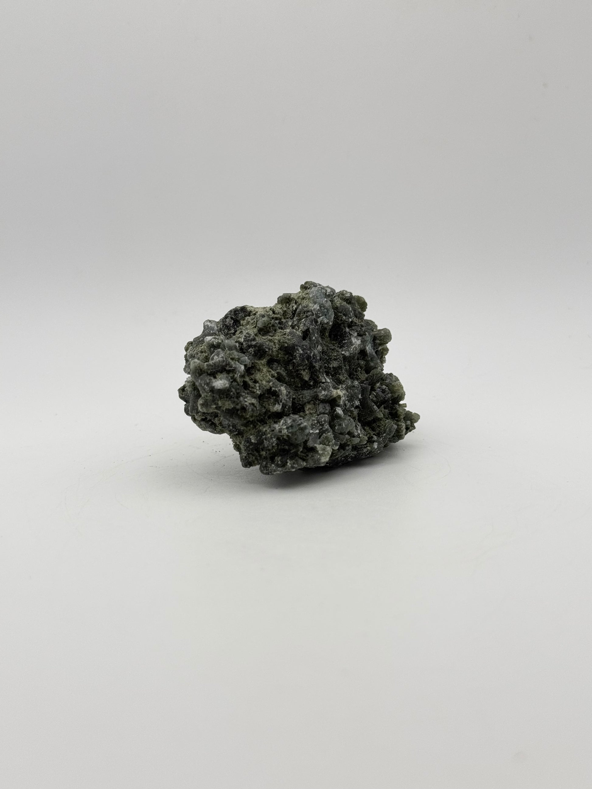 Raw prehnite specimen with amazing green color.