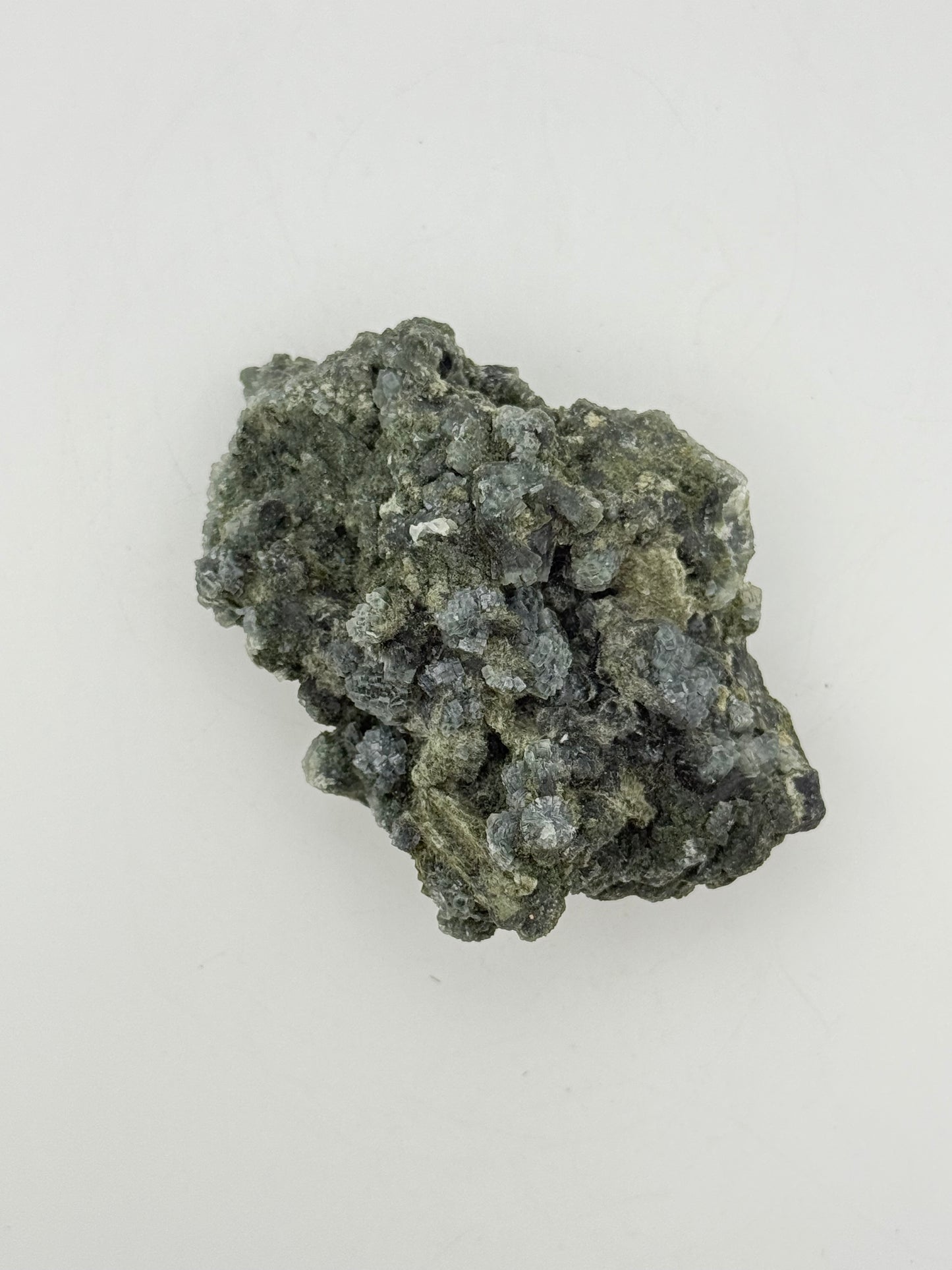 Raw prehnite specimen with amazing green color.