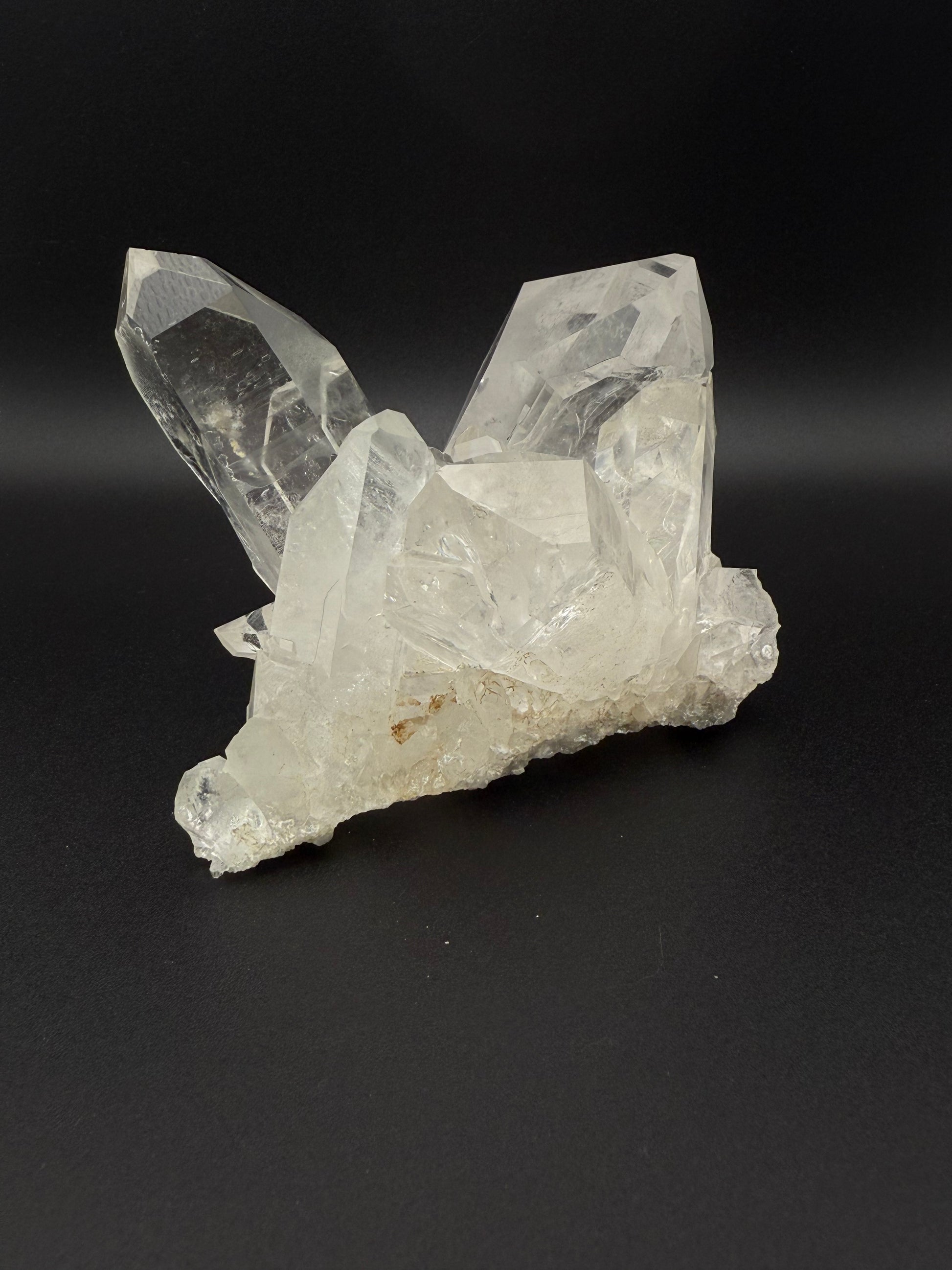 Large cluster of clear quartz crystals.