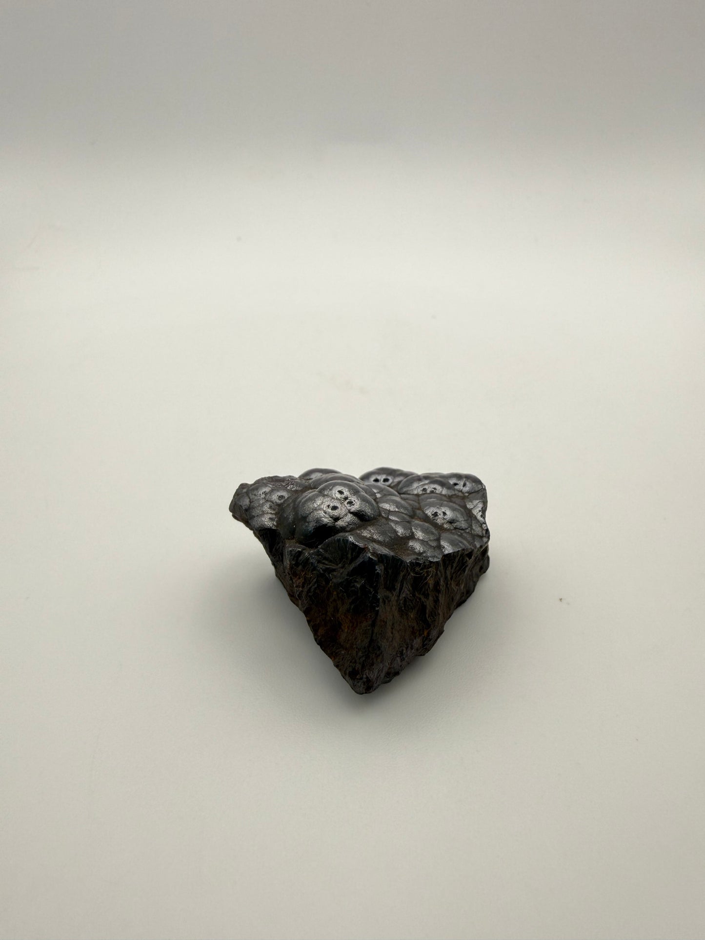Small raw hematite specimen.