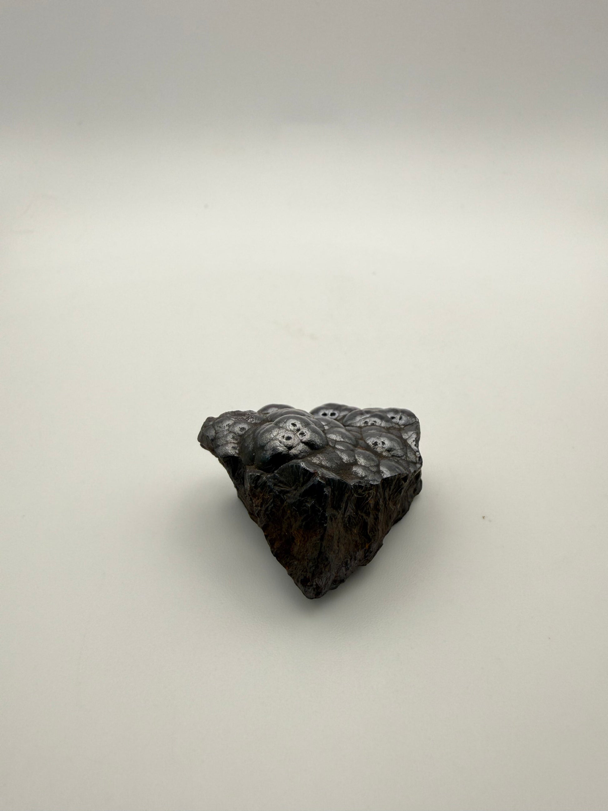 Small raw hematite specimen.