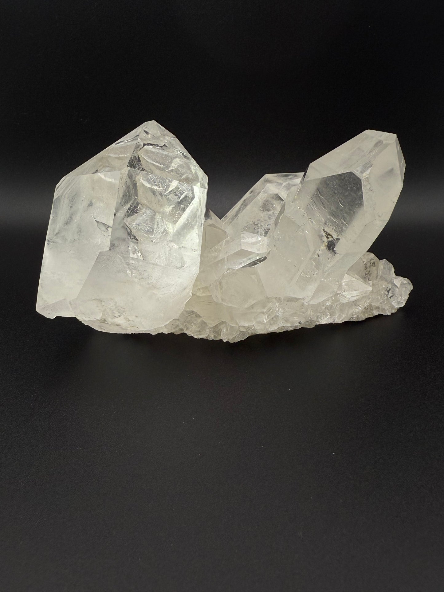 Large cluster of clear quartz crystals.