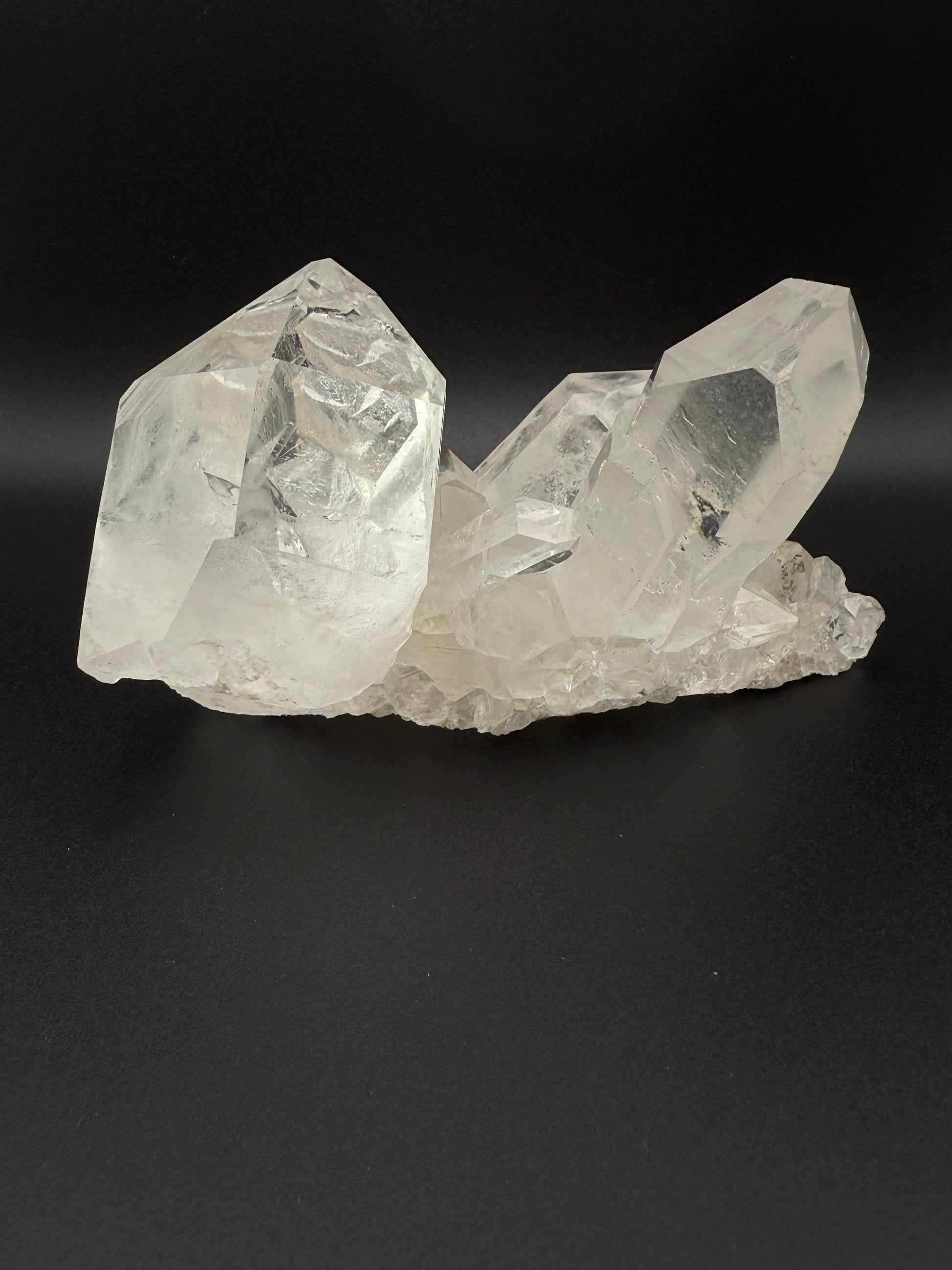 Large cluster of clear quartz crystals.