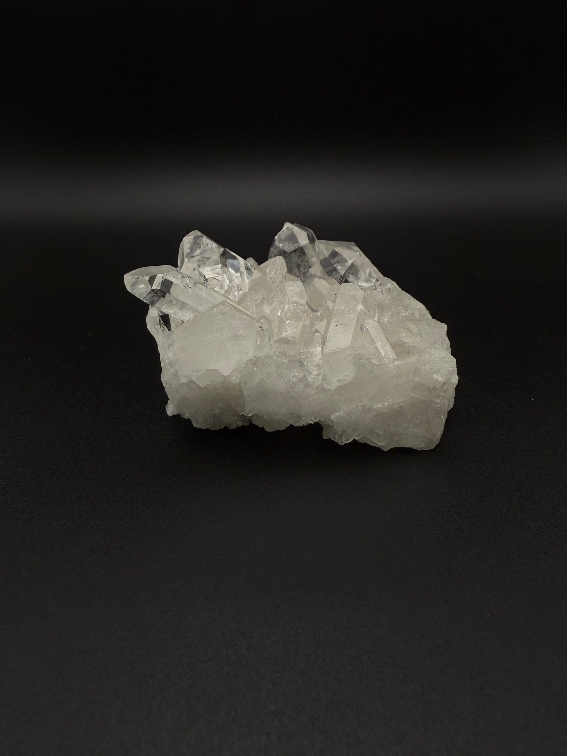 Clear Quartz crystal cluster specimen.