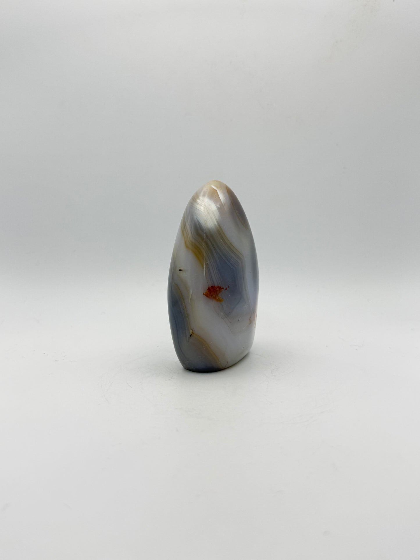 Polished orca agate free form.