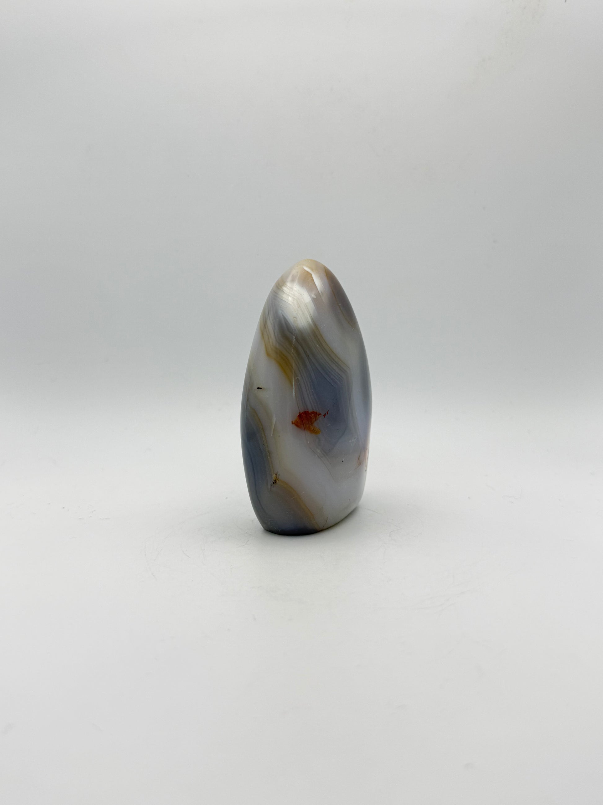 Polished orca agate free form.