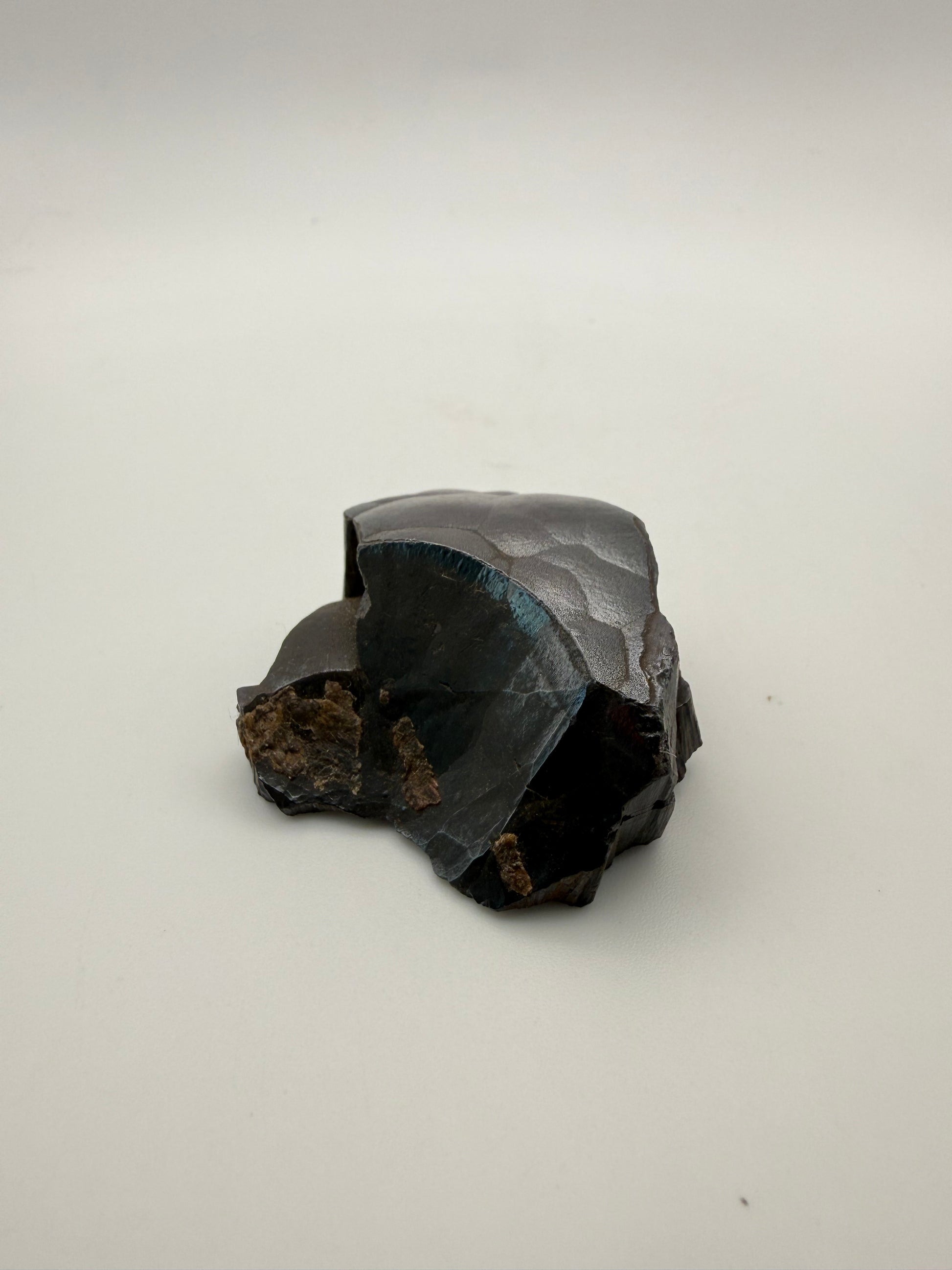 Small raw hematite specimen.