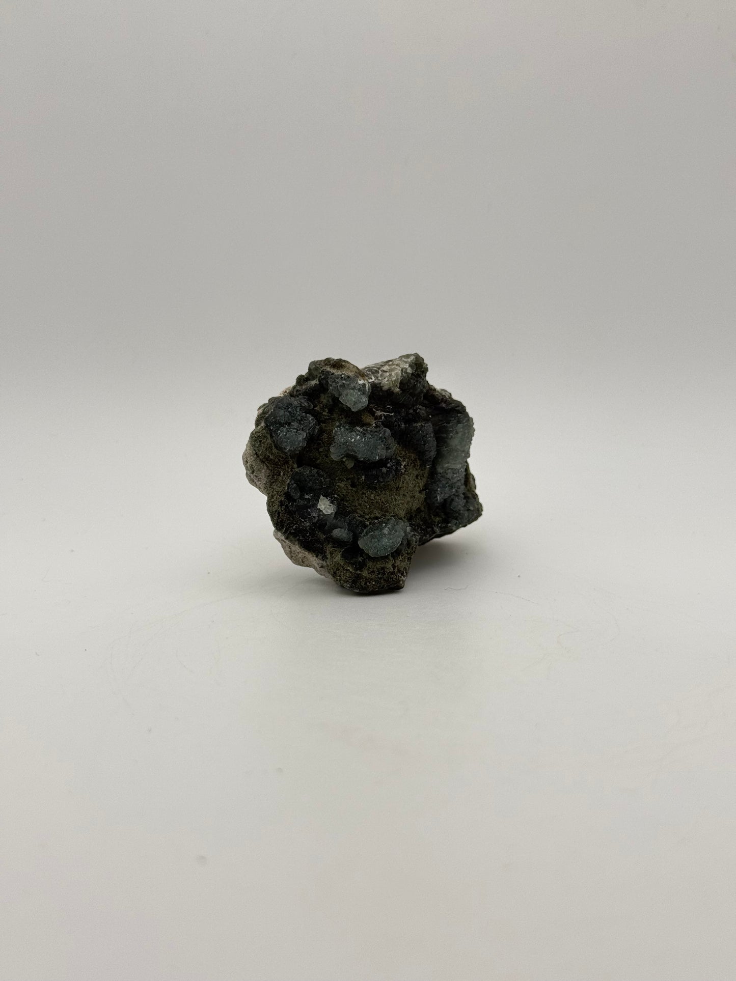 Raw prehnite specimen with amazing green color.