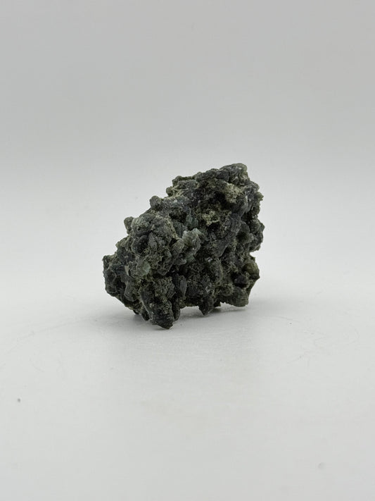 Raw prehnite specimen with amazing green color.