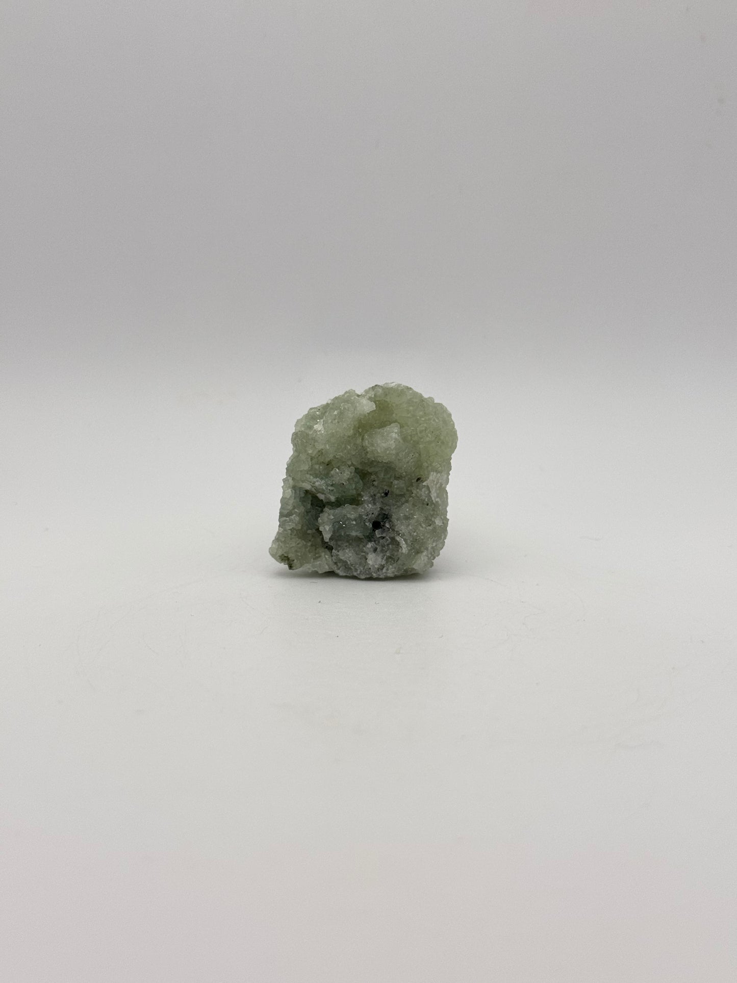 Raw prehnite specimen with amazing green color.