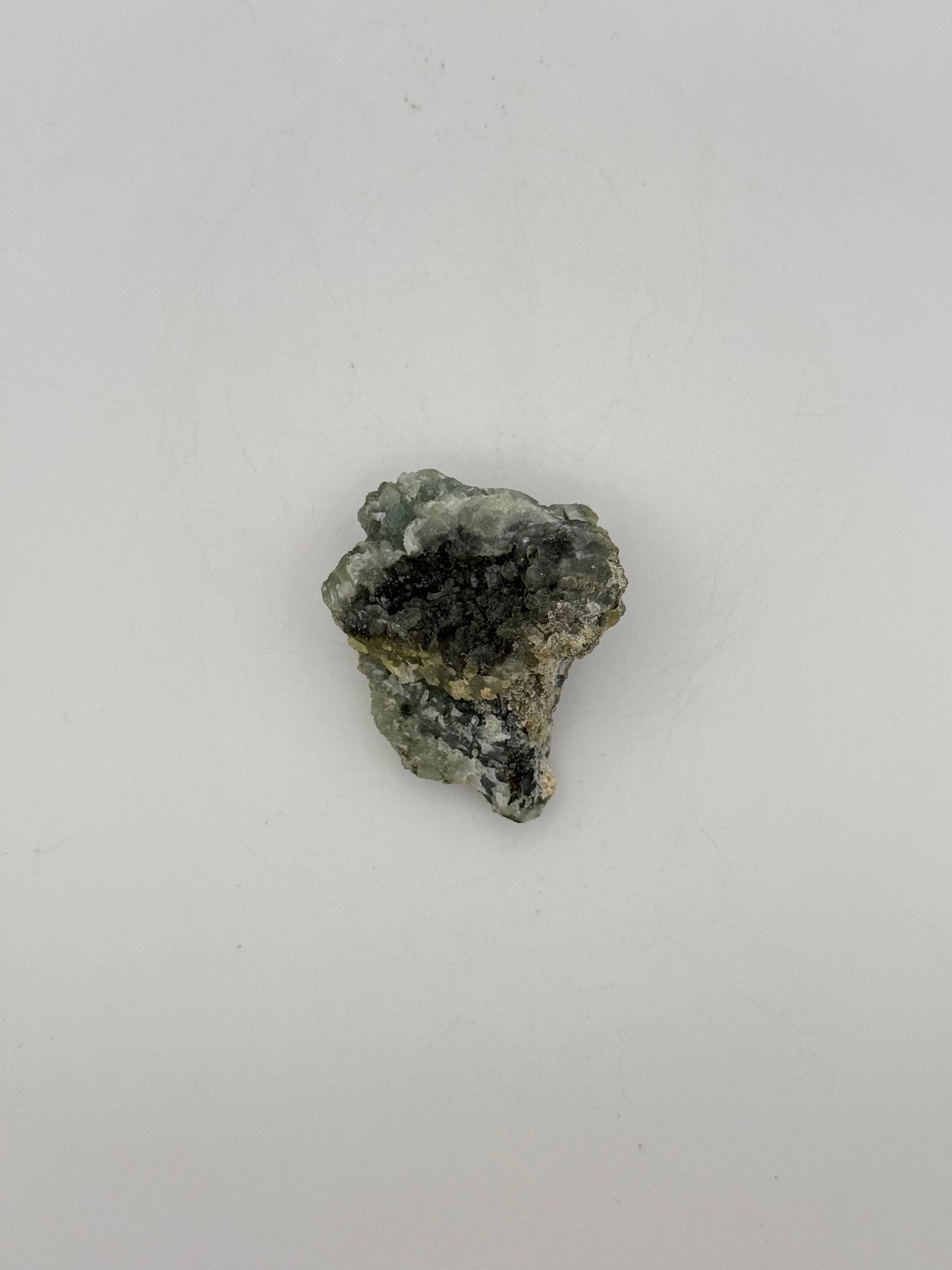 Raw prehnite specimen with amazing green color.