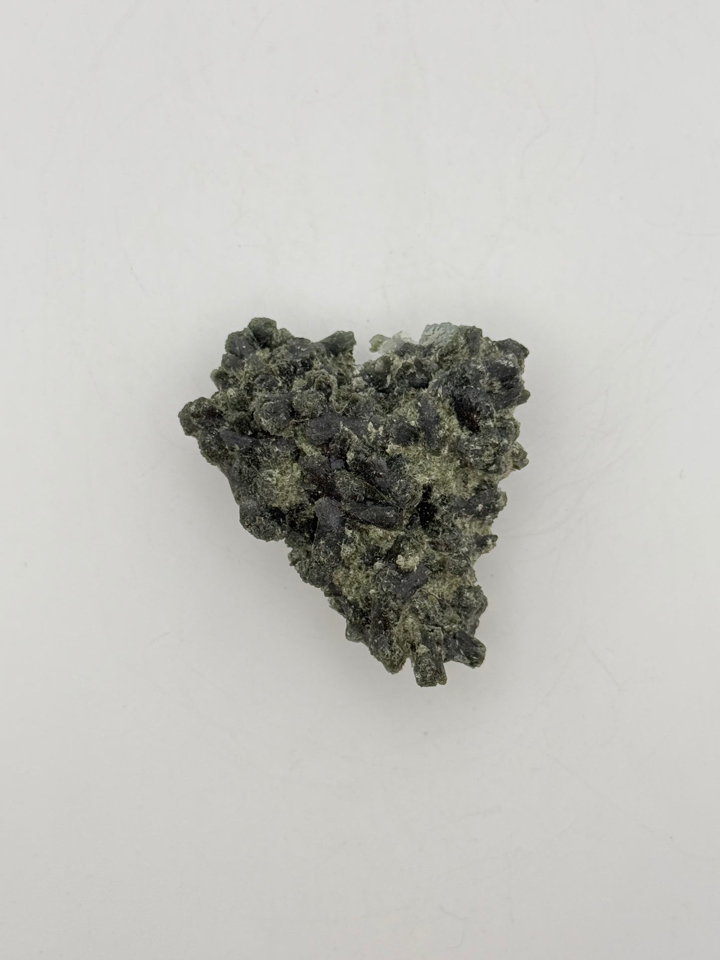 Raw prehnite specimen with amazing green color.