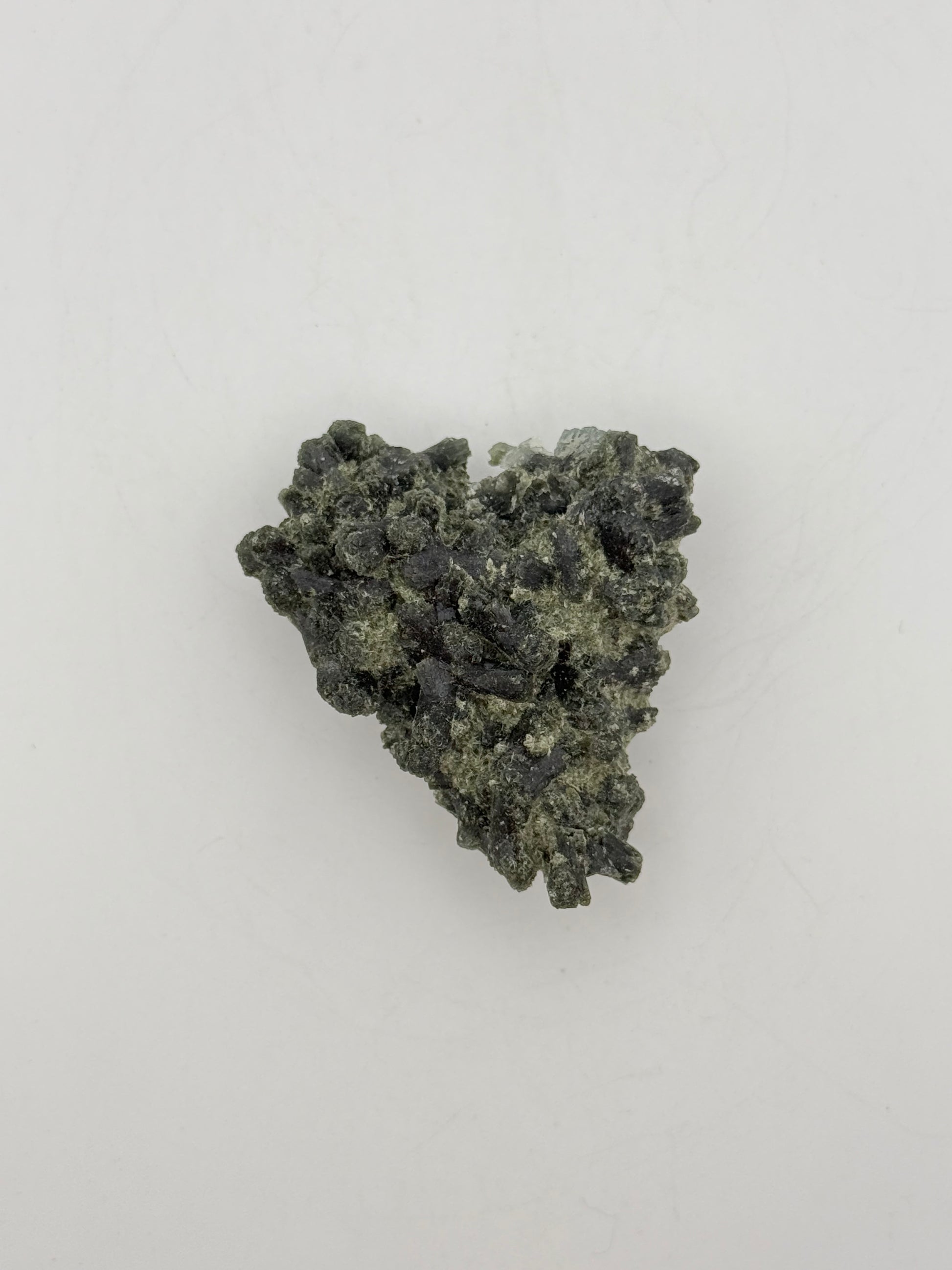 Raw prehnite specimen with amazing green color.