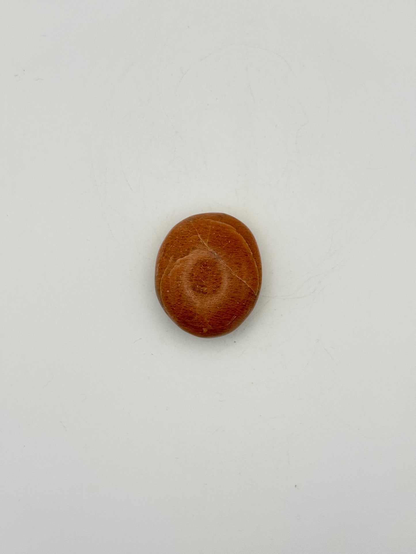 Polished Peach moonstone palm stone.