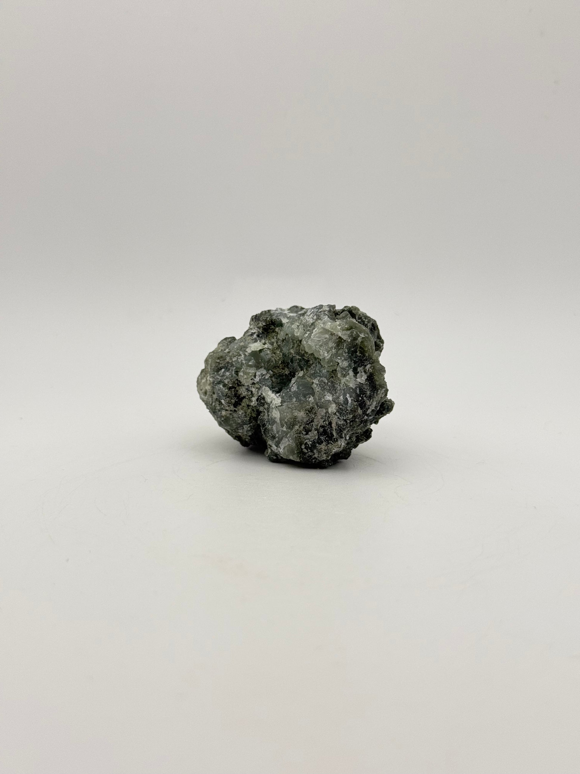 Raw prehnite specimen with amazing green color.