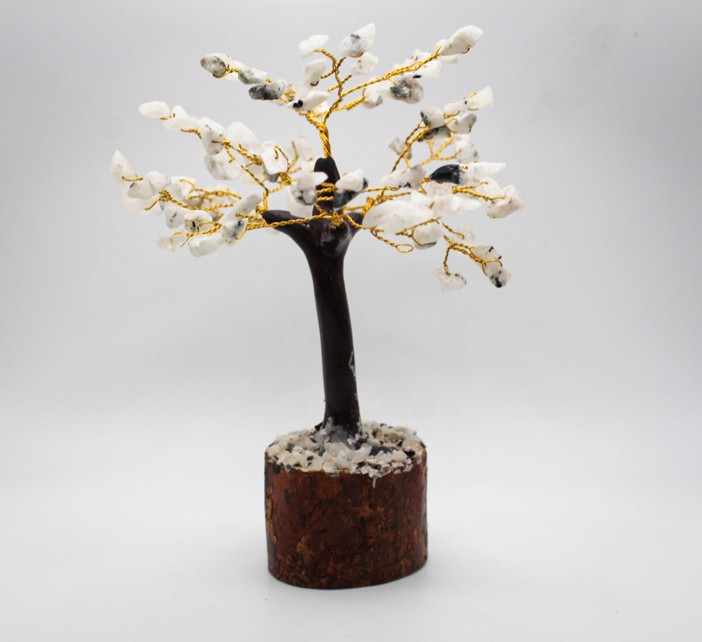 Tree made out of wire and rainbow moonstone crystal chips.