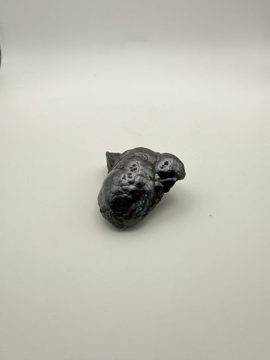 Small raw hematite specimen.