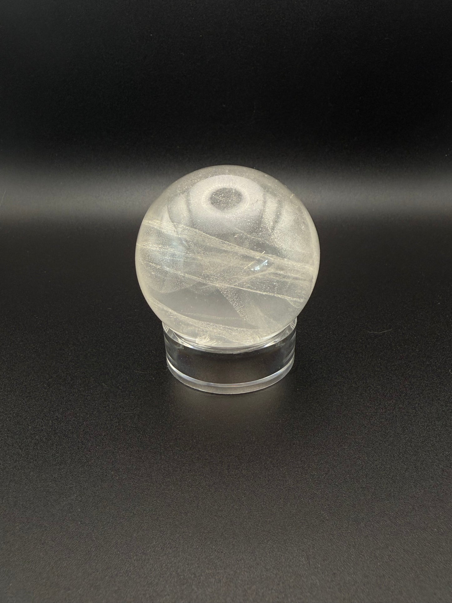 Clear quartz polished crystal sphere.