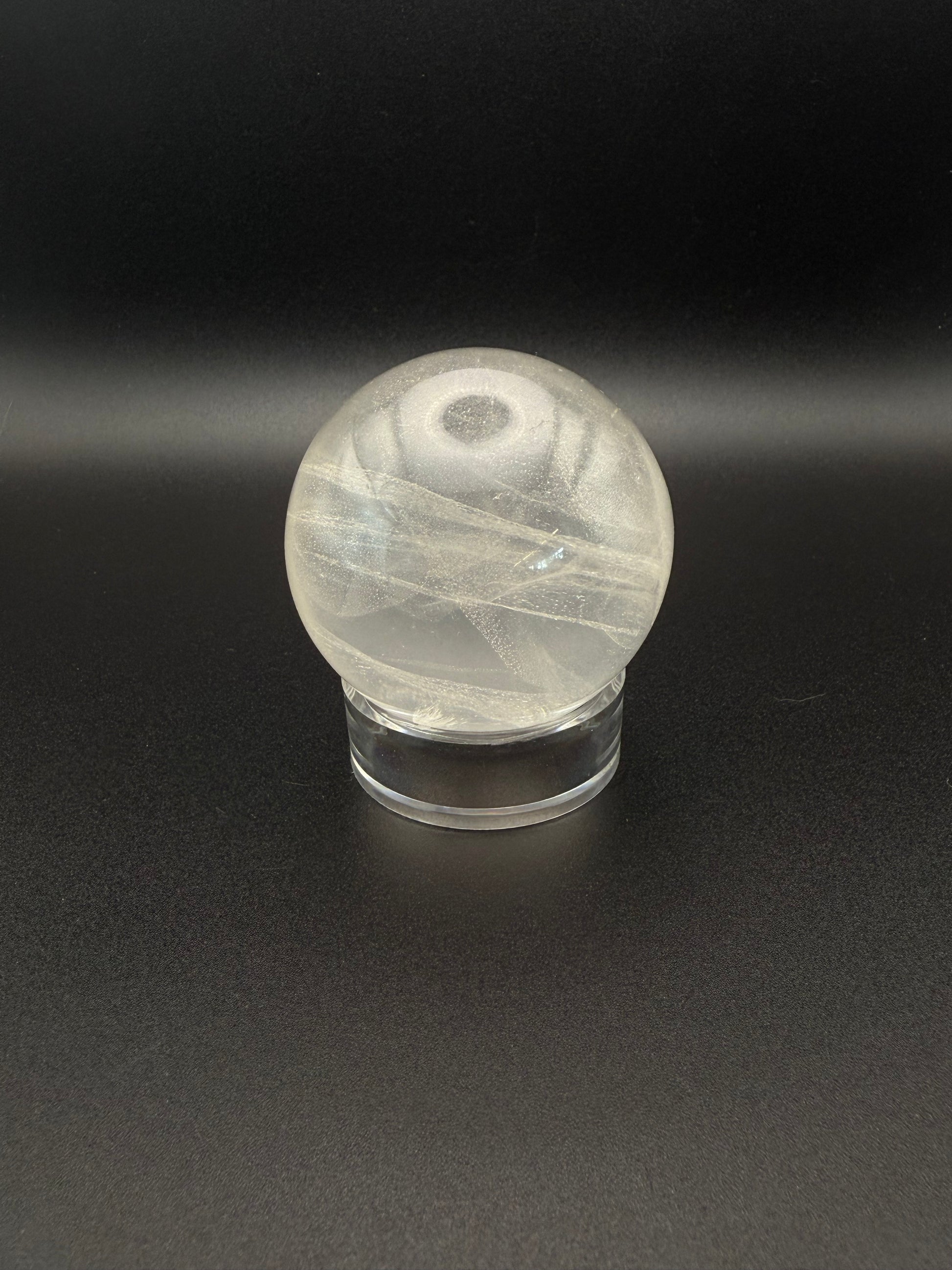 Clear quartz polished crystal sphere.