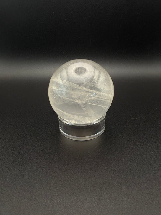 Clear quartz polished crystal sphere.
