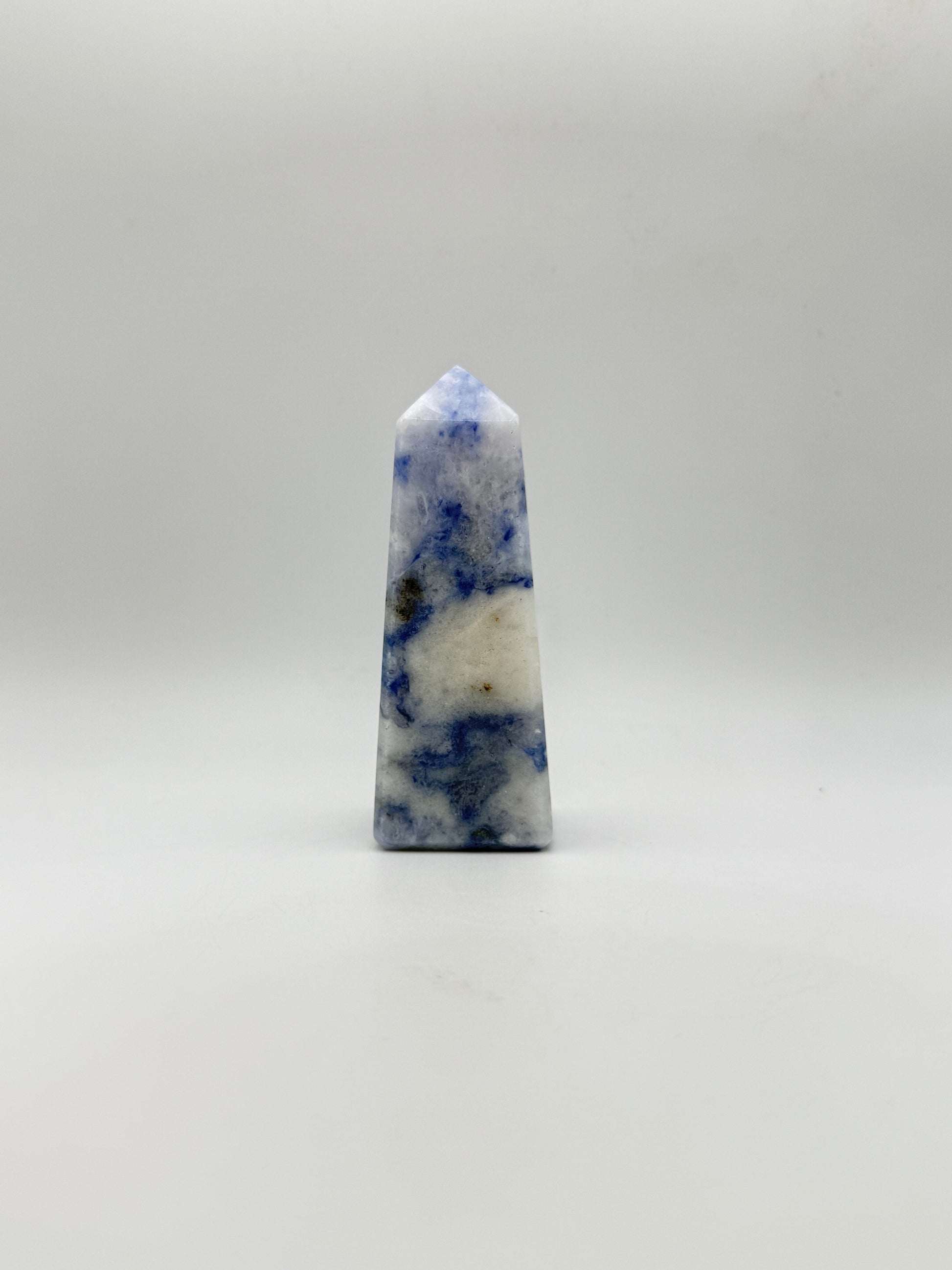 Afghanite four sided tower. Height of 3 1/2 inches, width of 1 1/4 inches.