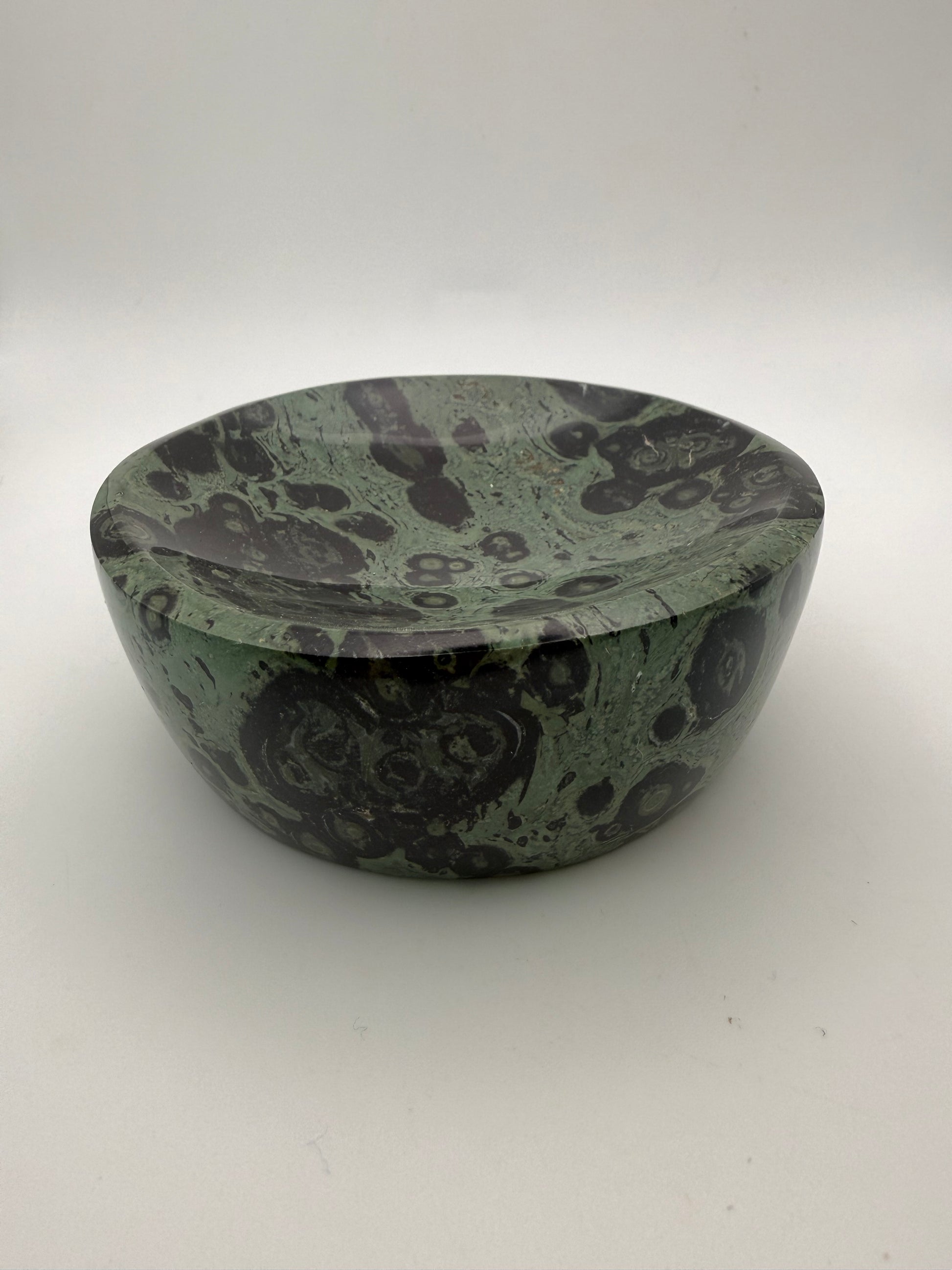 Polished kambaba jasper in the shape of a bowl.