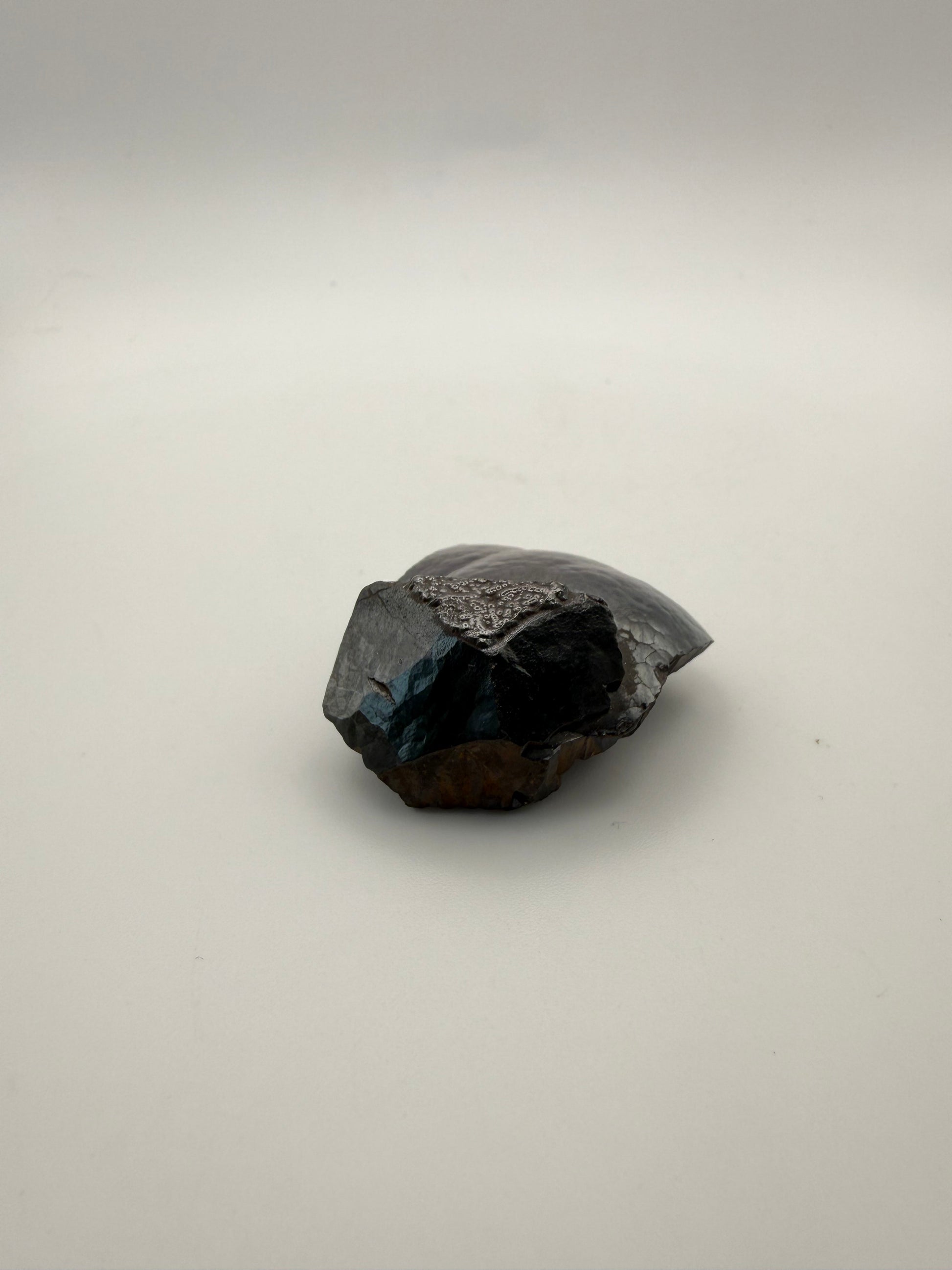 Small raw hematite specimen.