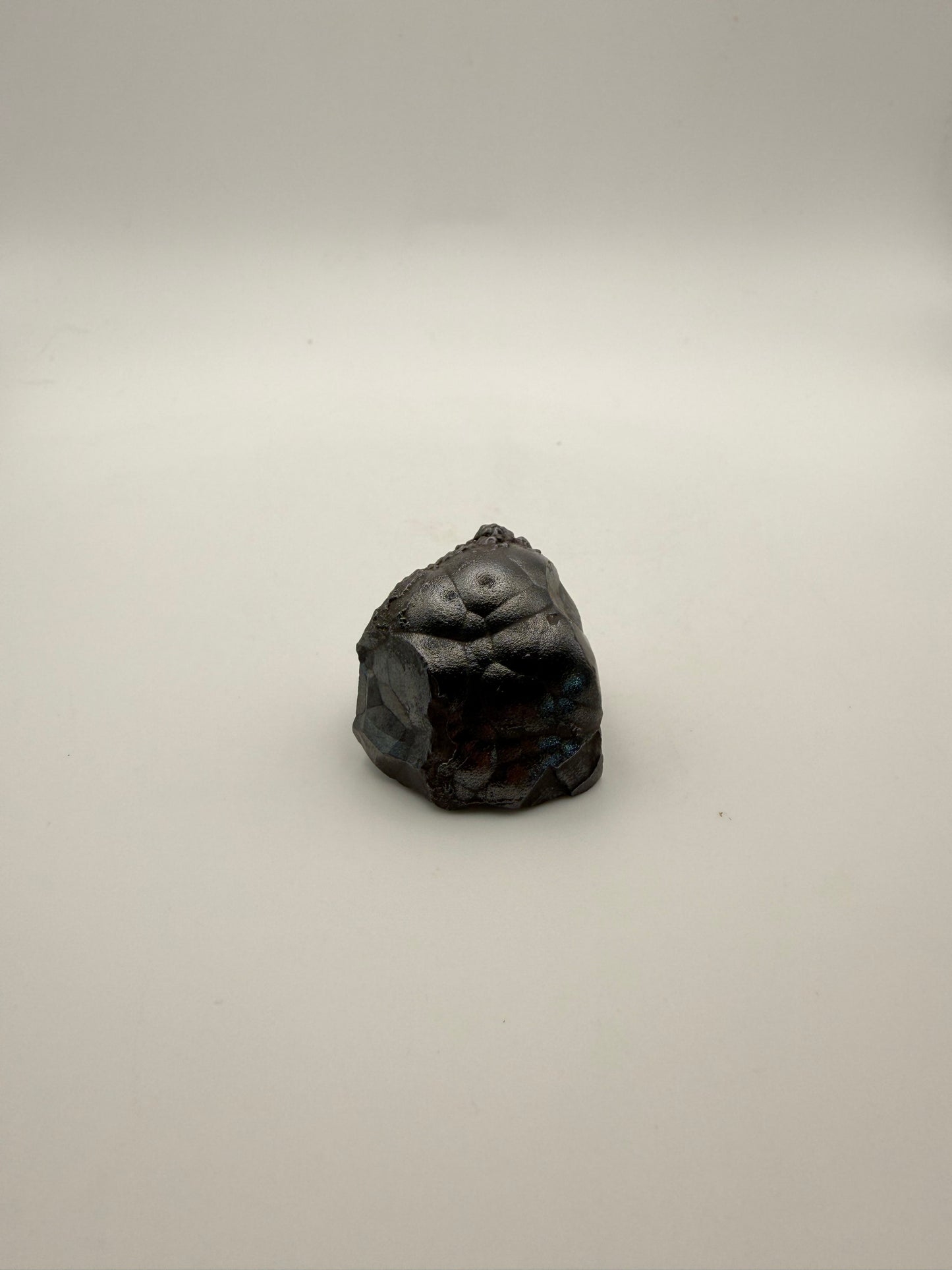 Small raw hematite specimen.