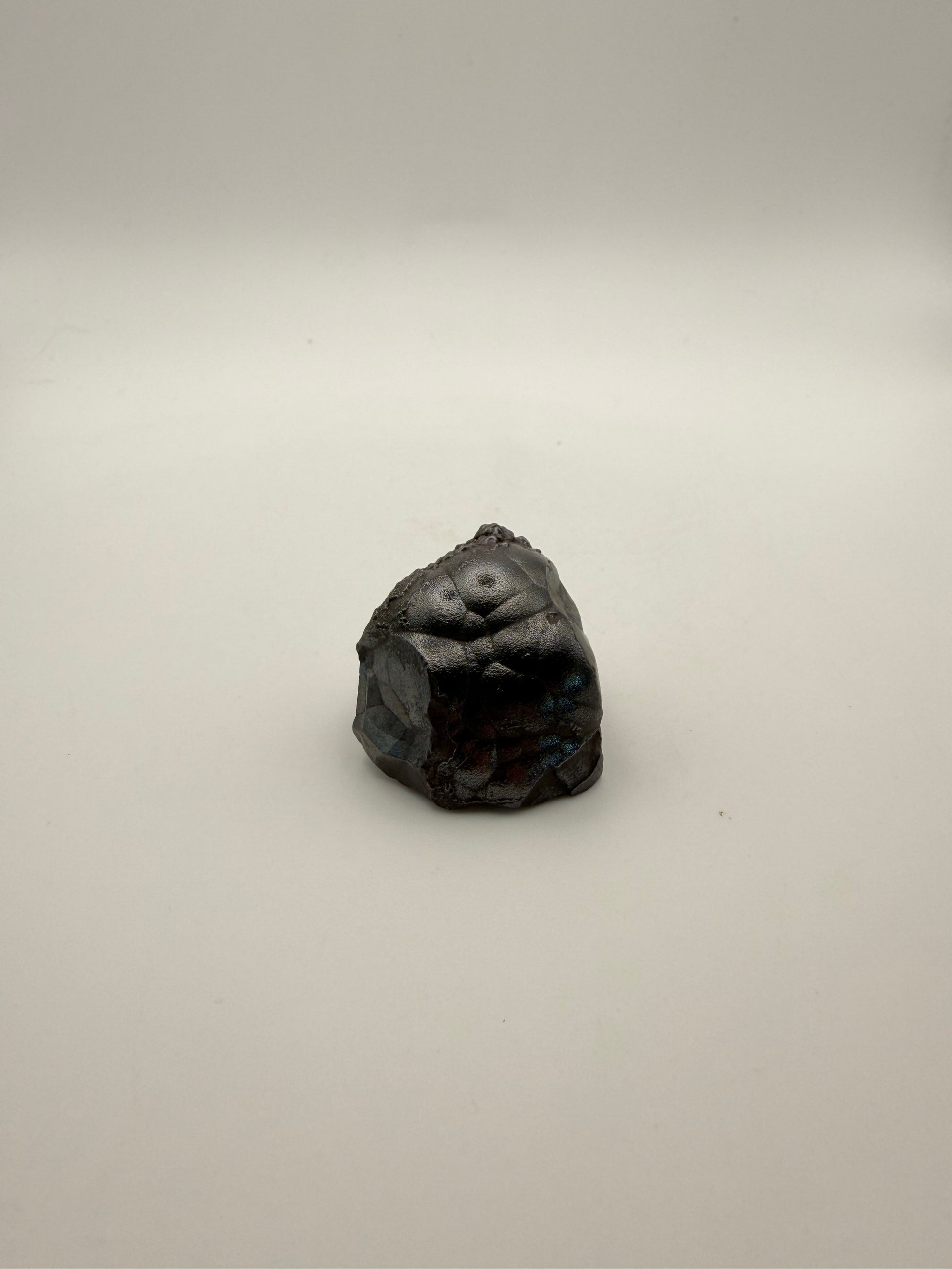 Small raw hematite specimen.