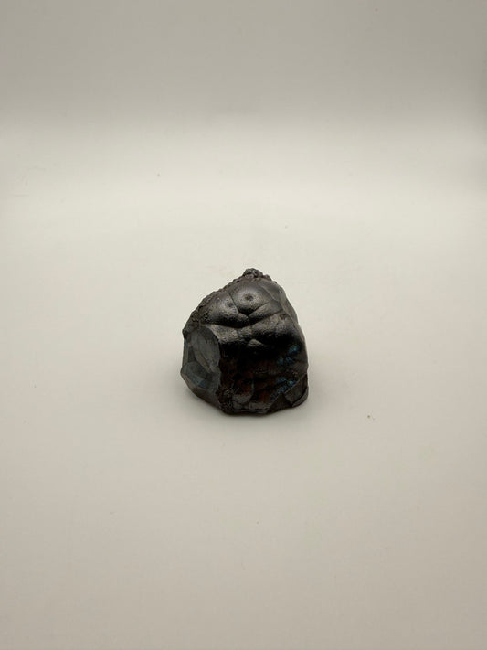 Small raw hematite specimen.