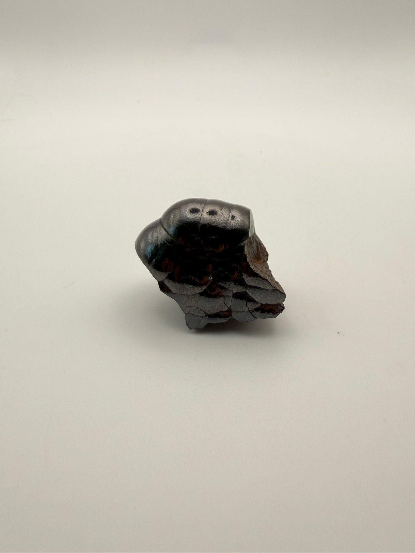 Small raw hematite specimen.