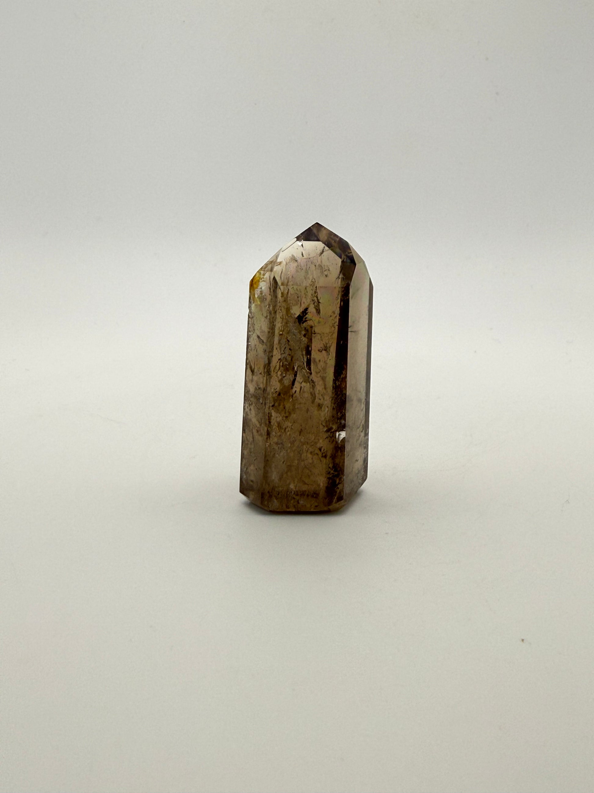 Polished natural citrine point.