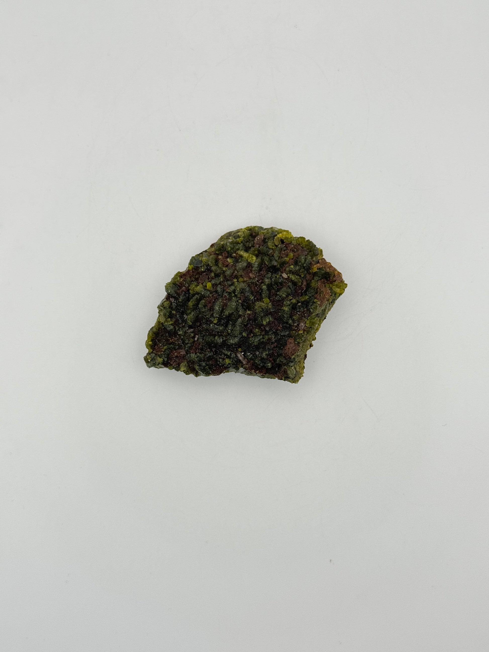 Epidote crystal cluster with good green color.