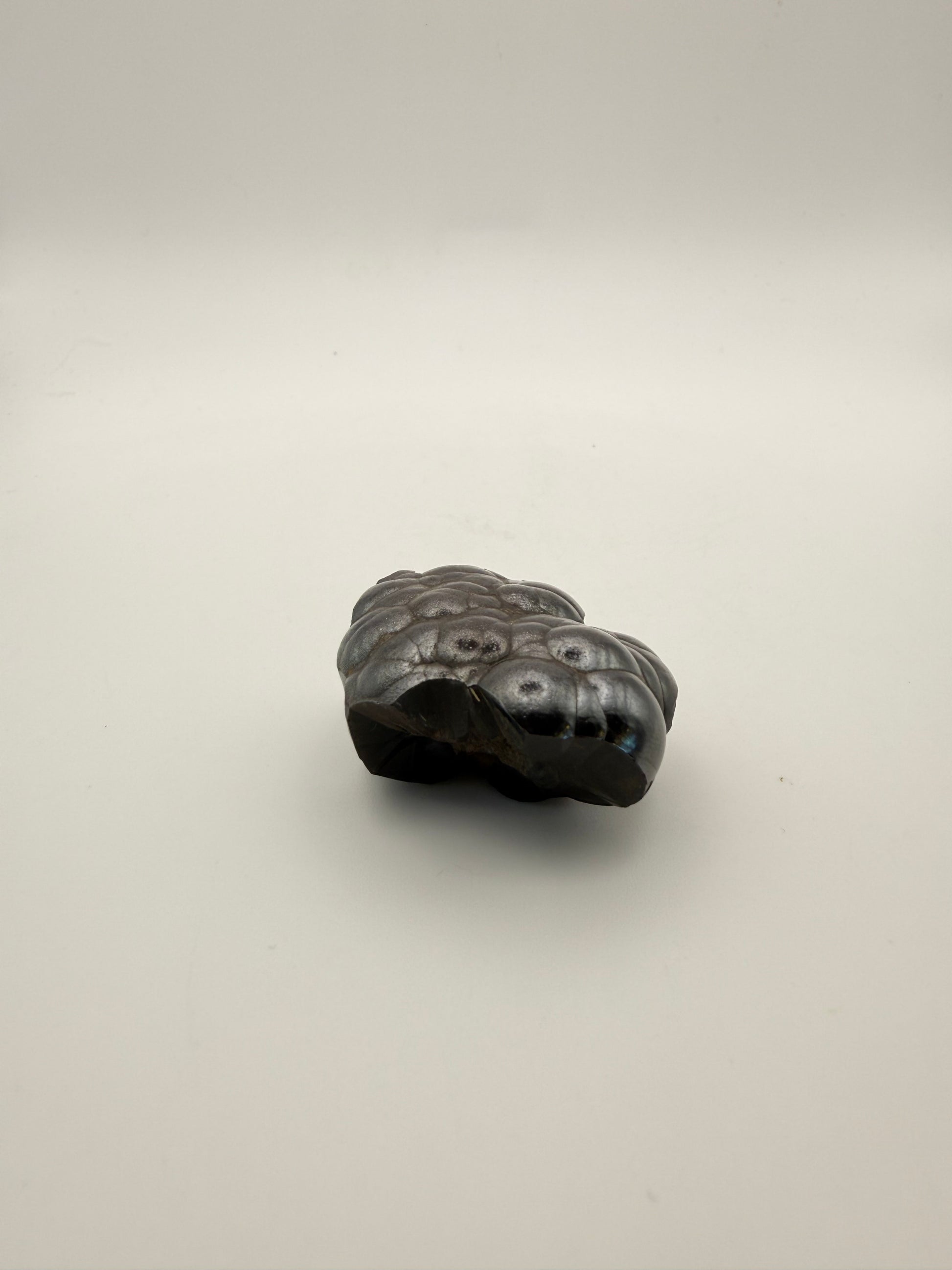 Small raw hematite specimen.