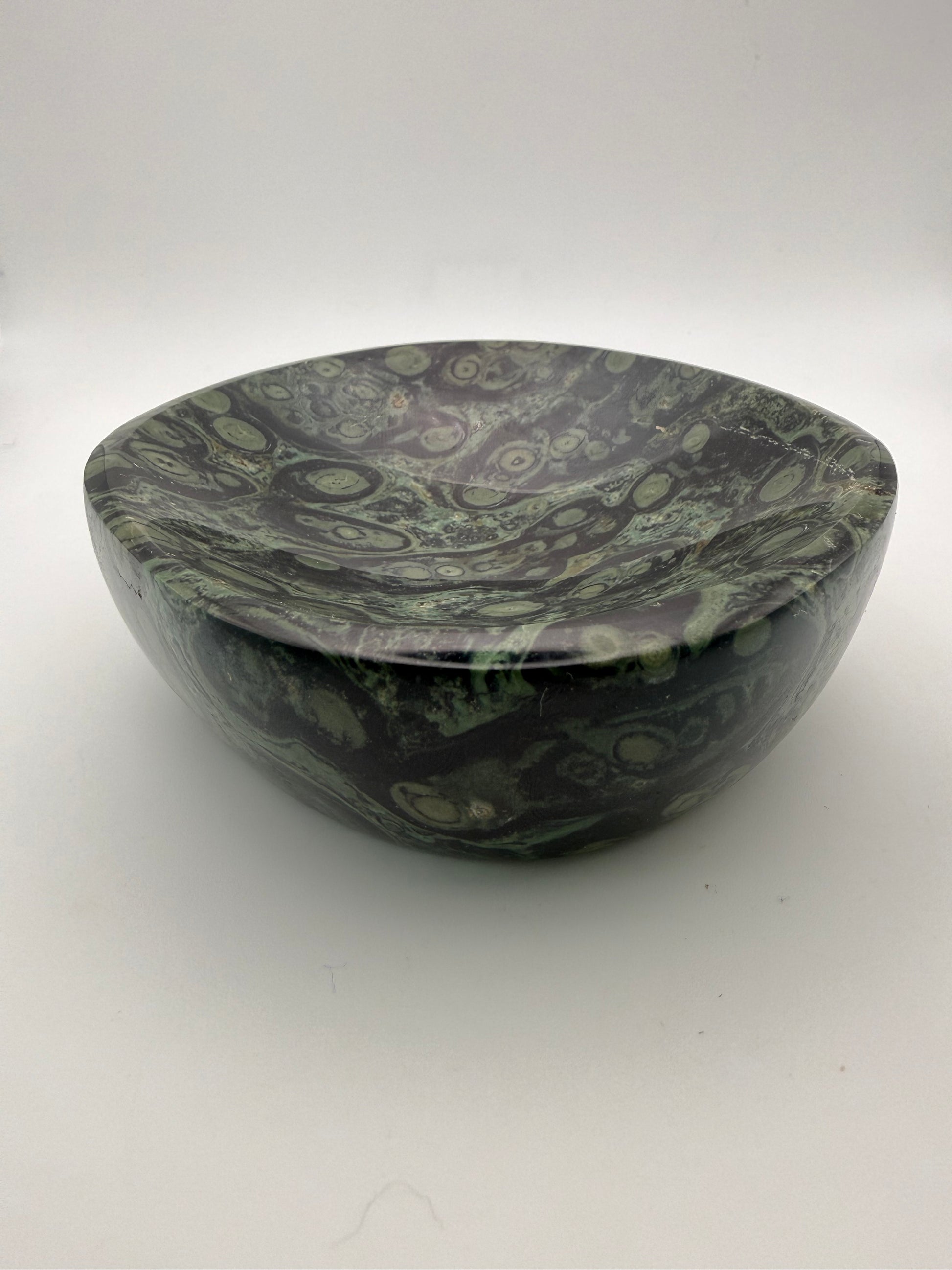 Polished kambaba jasper in the shape of a bowl.