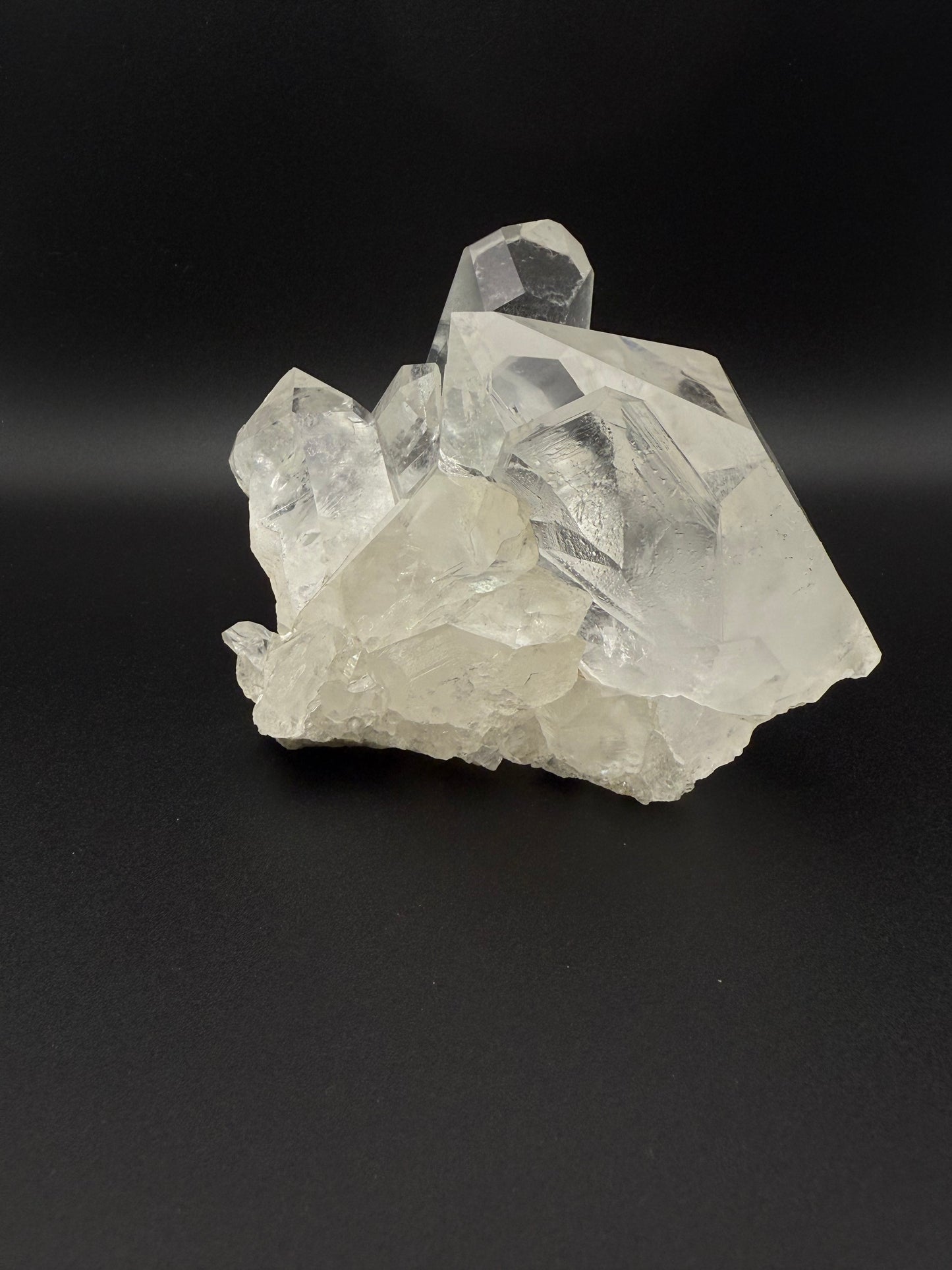 Large cluster of clear quartz crystals.