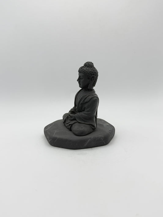 Shungite carving of a buddha.