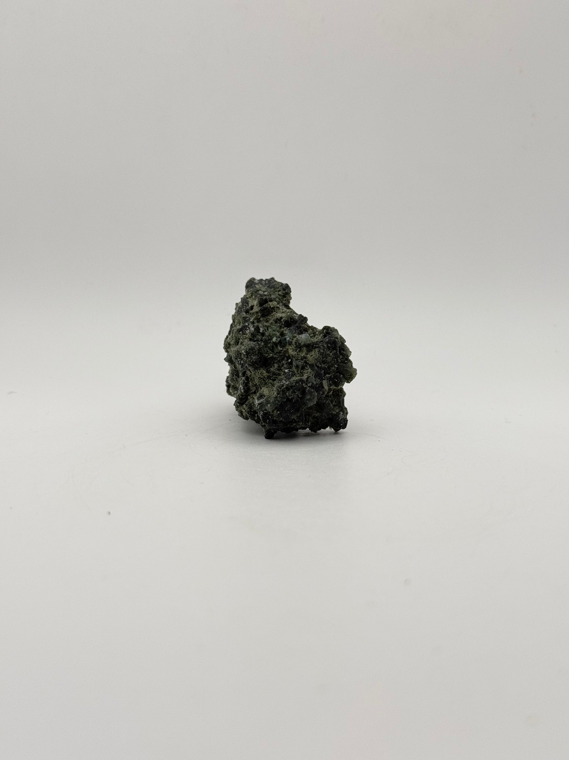 Raw prehnite specimen with amazing green color.