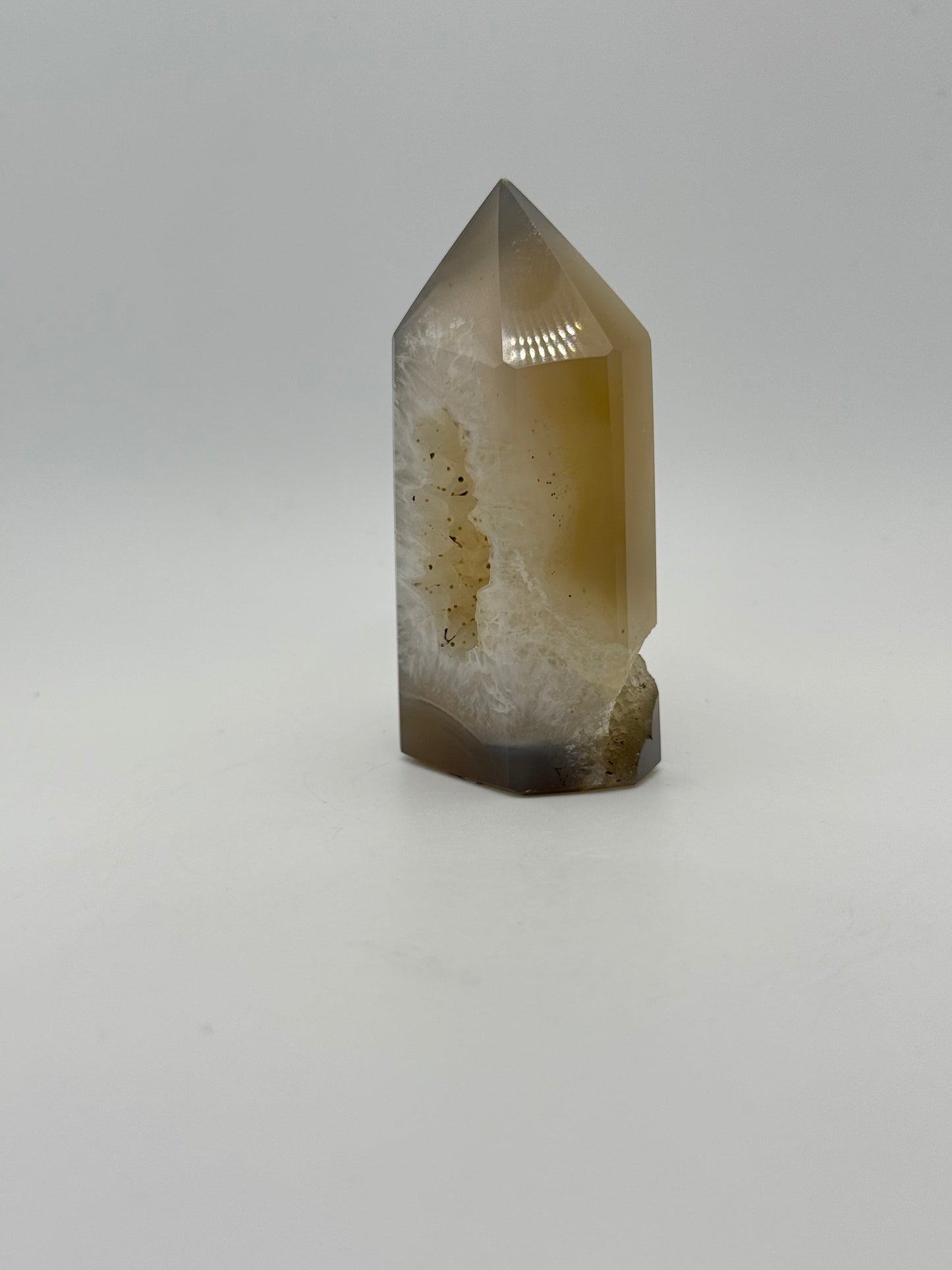 Polished druzy agate tower. About 3  inches tall.
