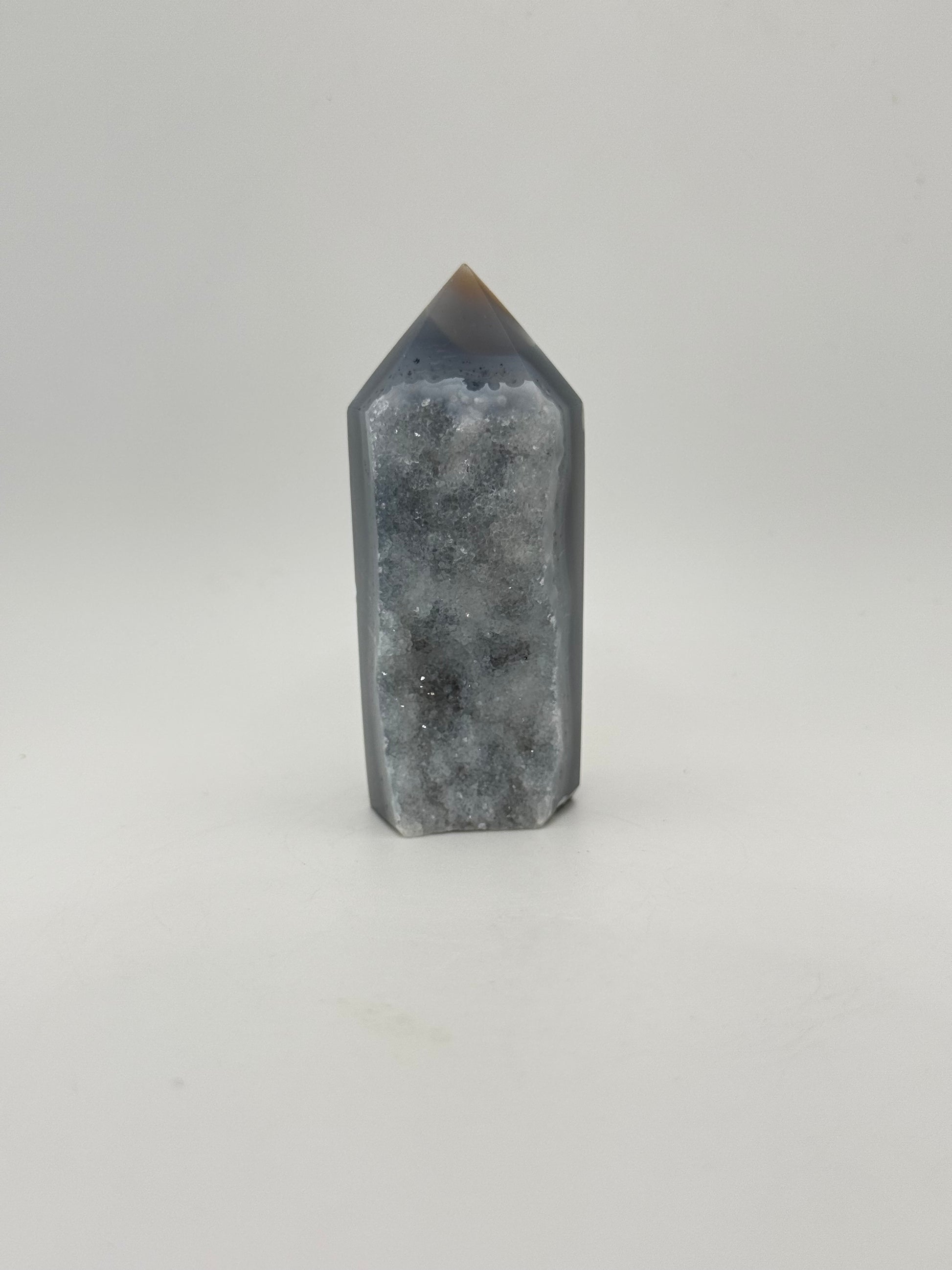Polished druzy agate tower. About 3  inches tall.