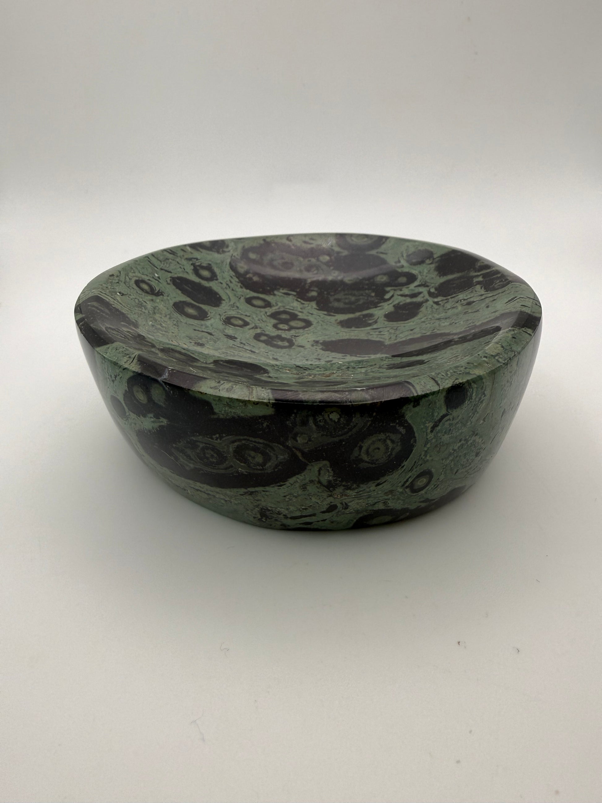 Polished kambaba jasper in the shape of a bowl.