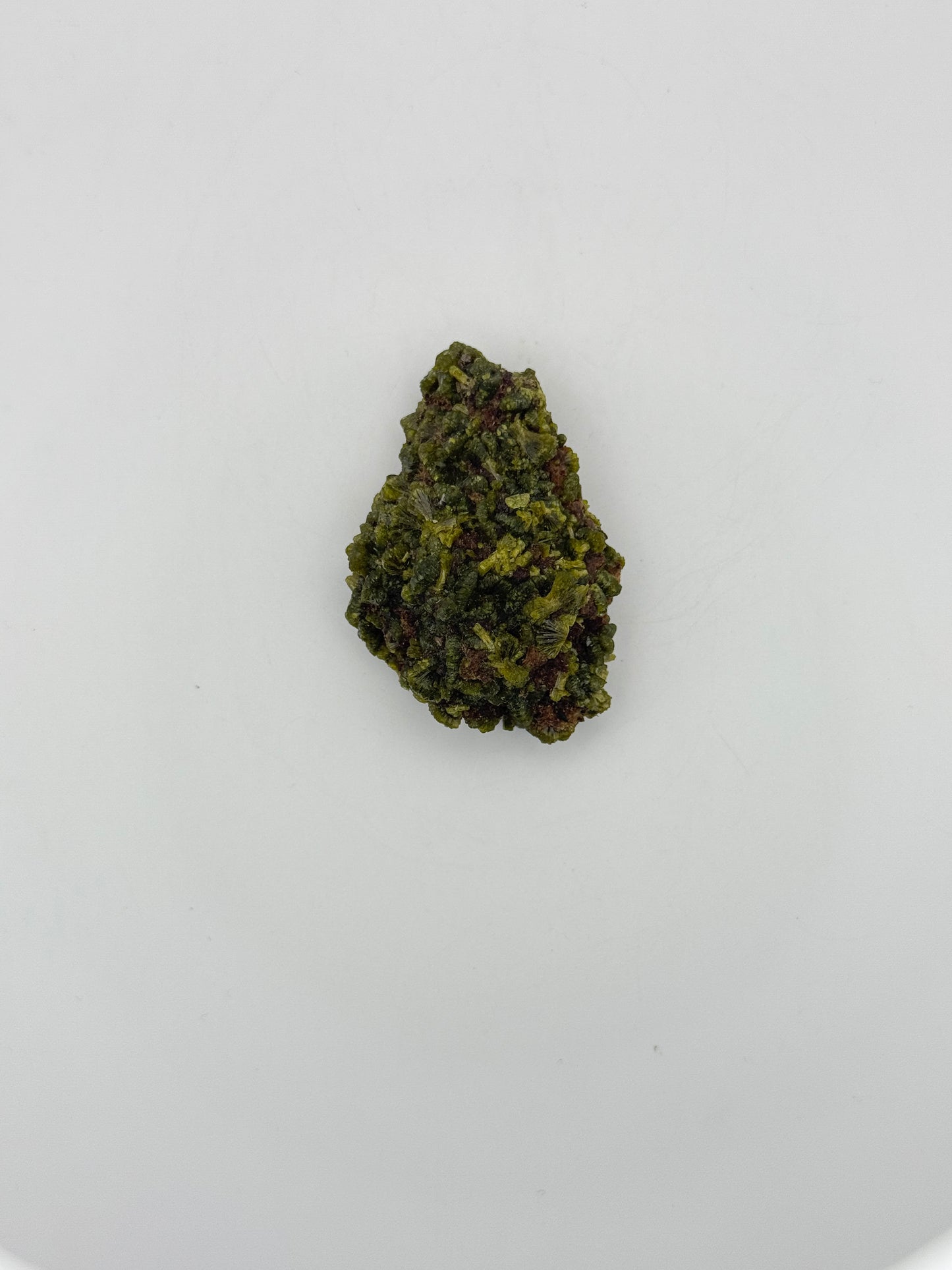 Epidote crystal cluster with good green color.