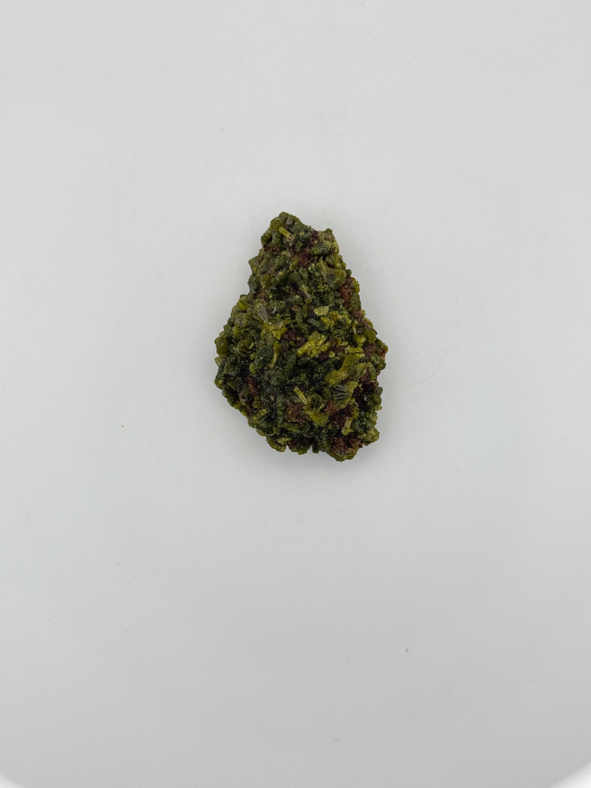 Epidote crystal cluster with good green color.
