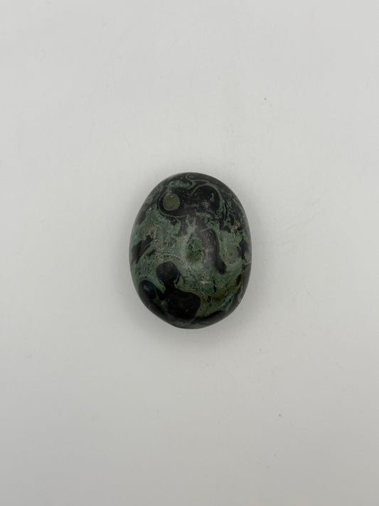 Polished kambaba jasper palm stone.