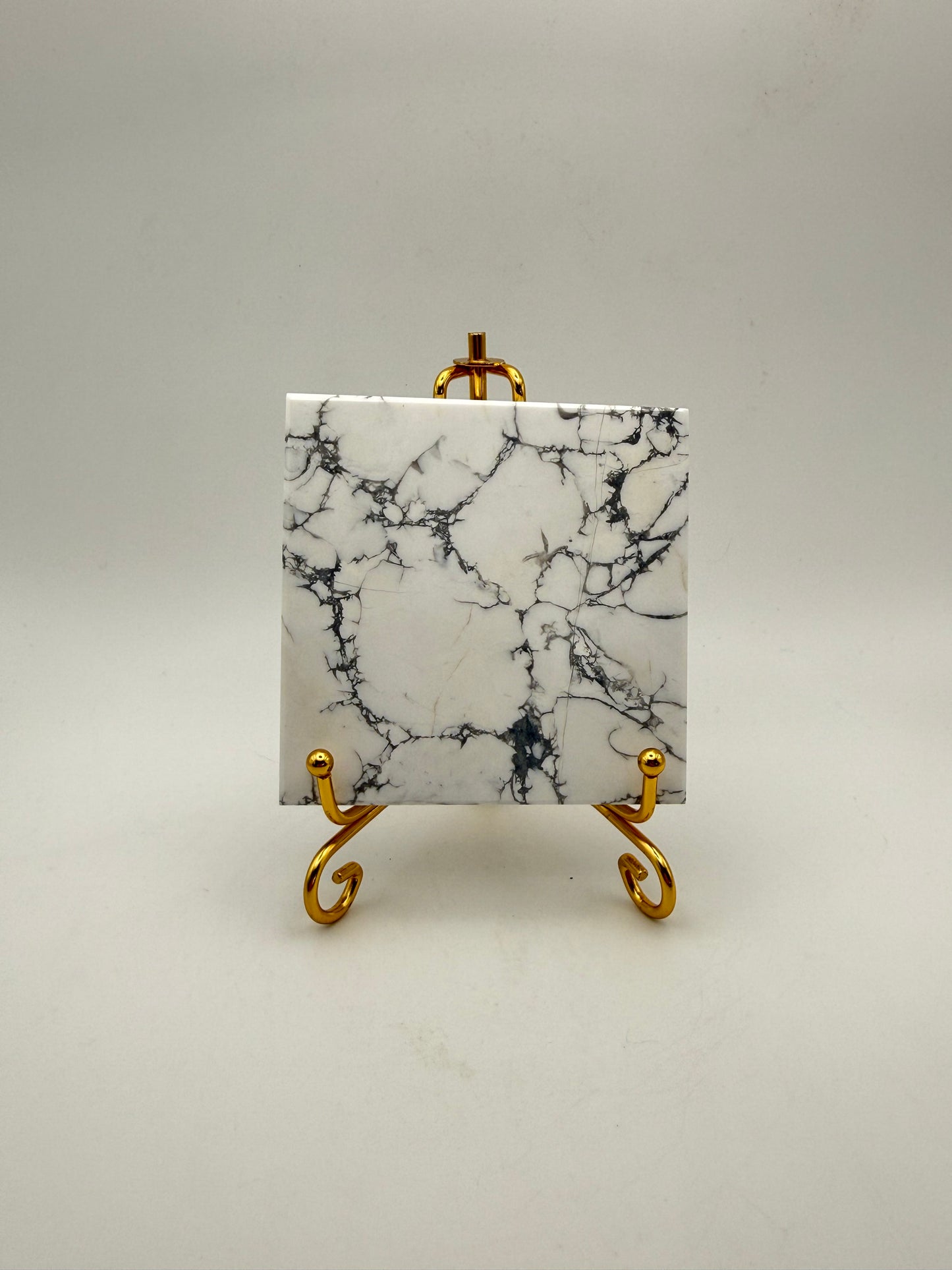 Polished howlite square tile.